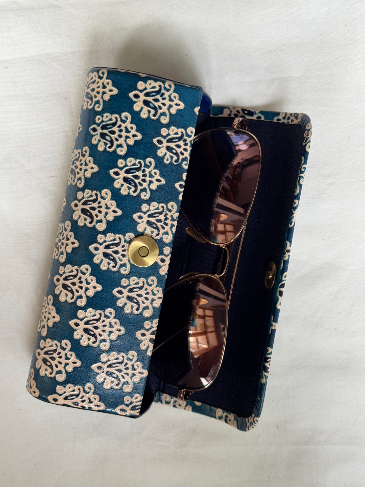 Hand embossed hand painted leather spectacles / goggles case