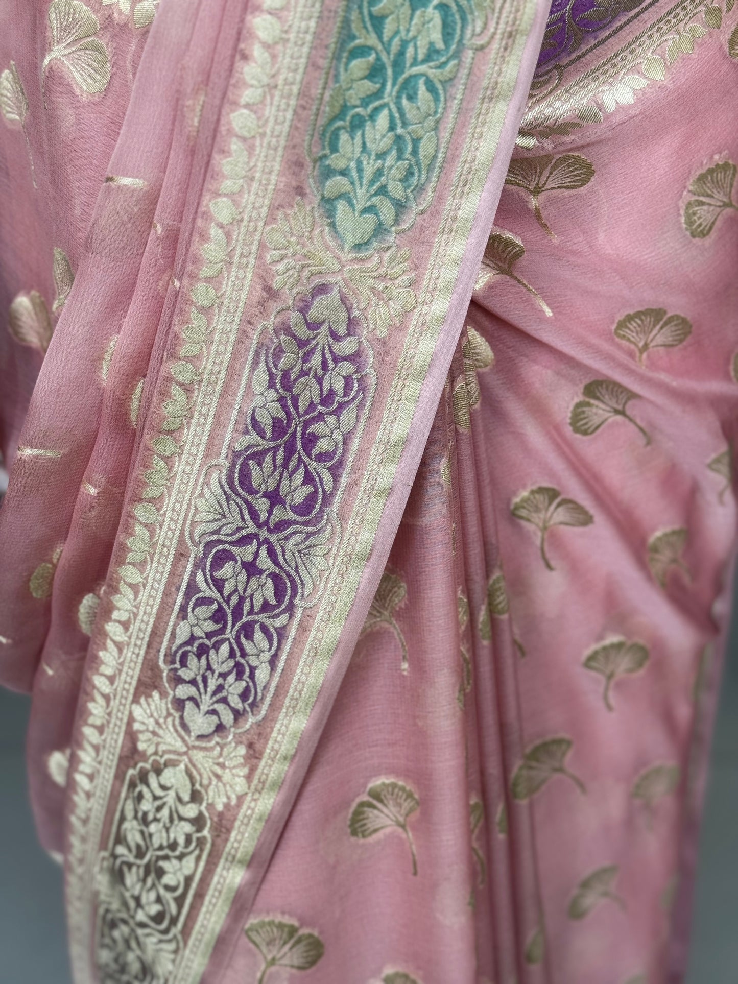 Light pink Banarasi georgette saree with colorful painted border