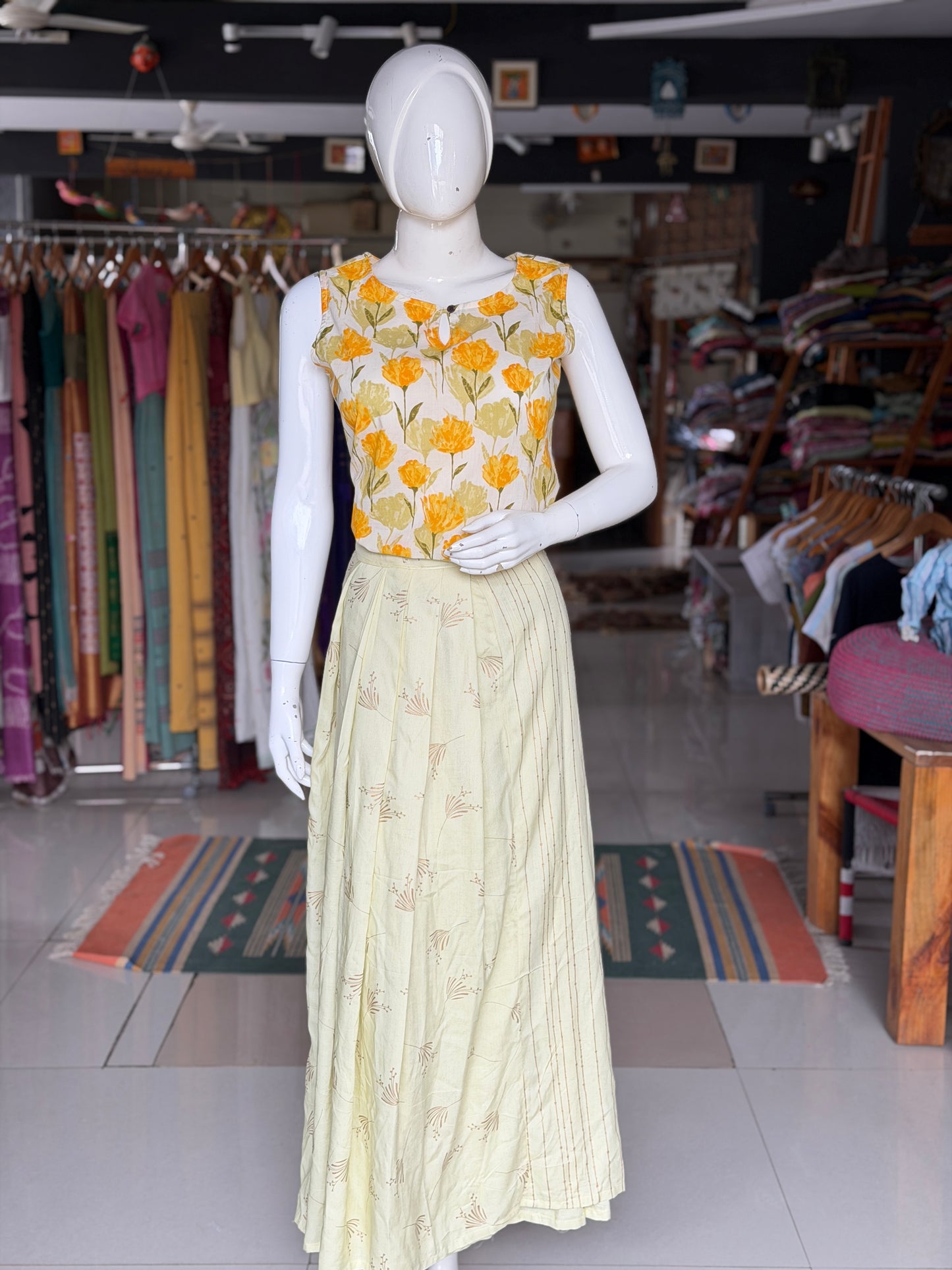 Light yellow wrap around skirt with plain and pleated panels - free size
