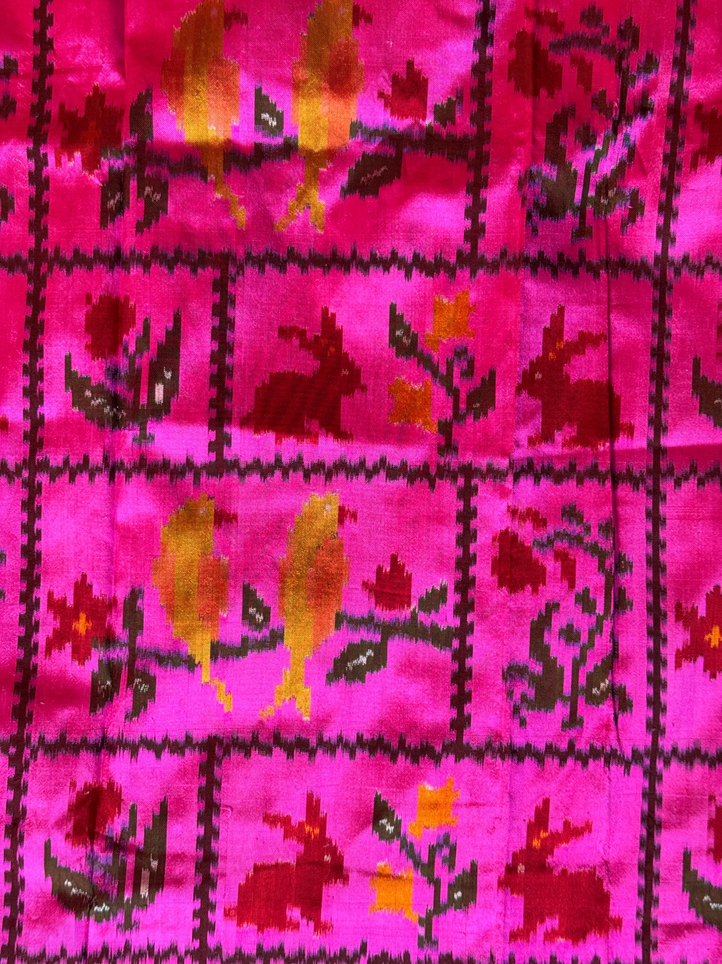 Hot pink pattu ikat silk handwoven fabric with rabbits, birds n flowers motif