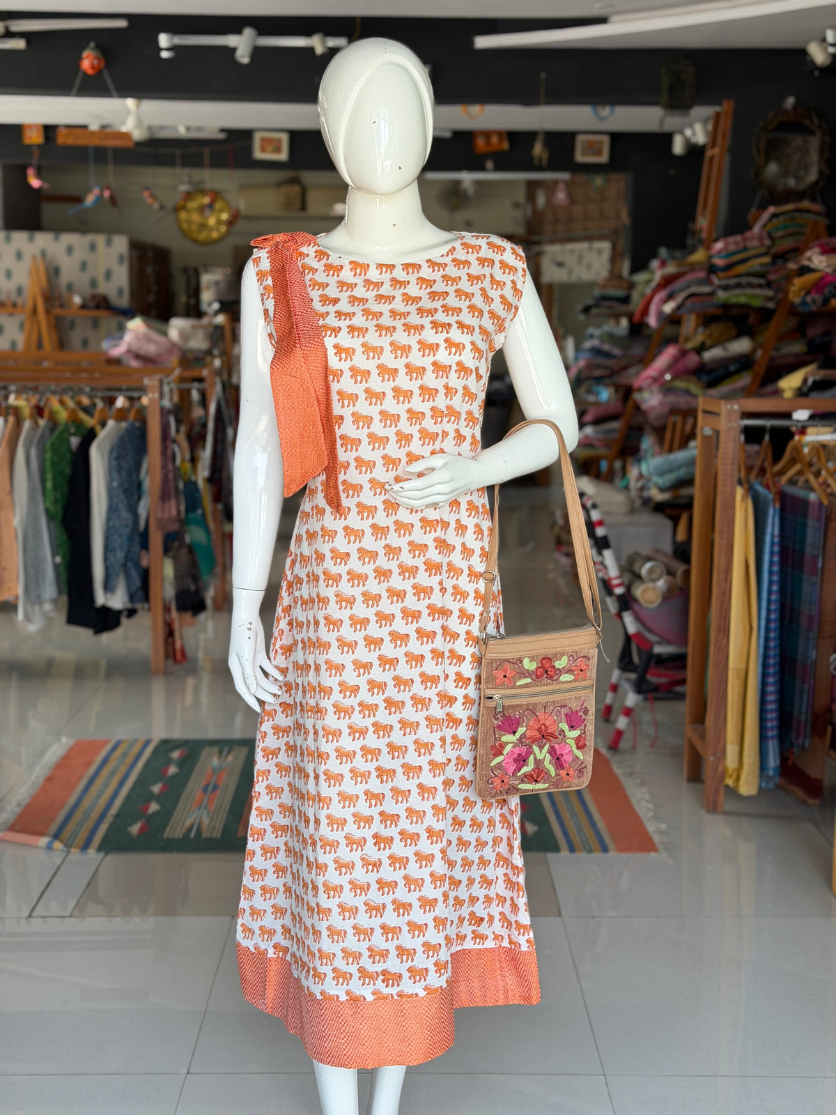 White n Orange cotton dress with horses hand block prints and handwoven 4 pedal weave trims