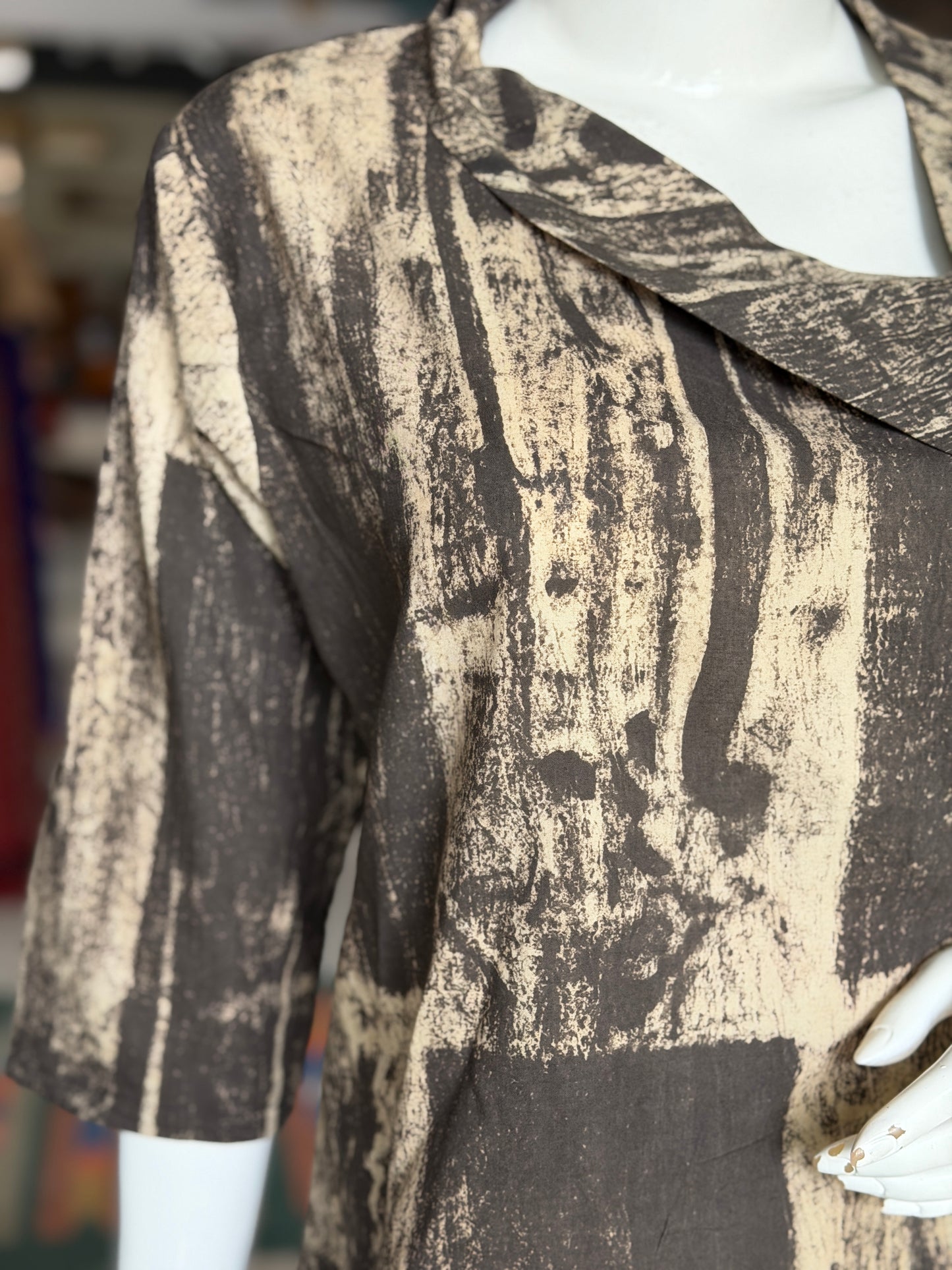 Black and beige hand block printed cotton top with asymmetric neck and side tie