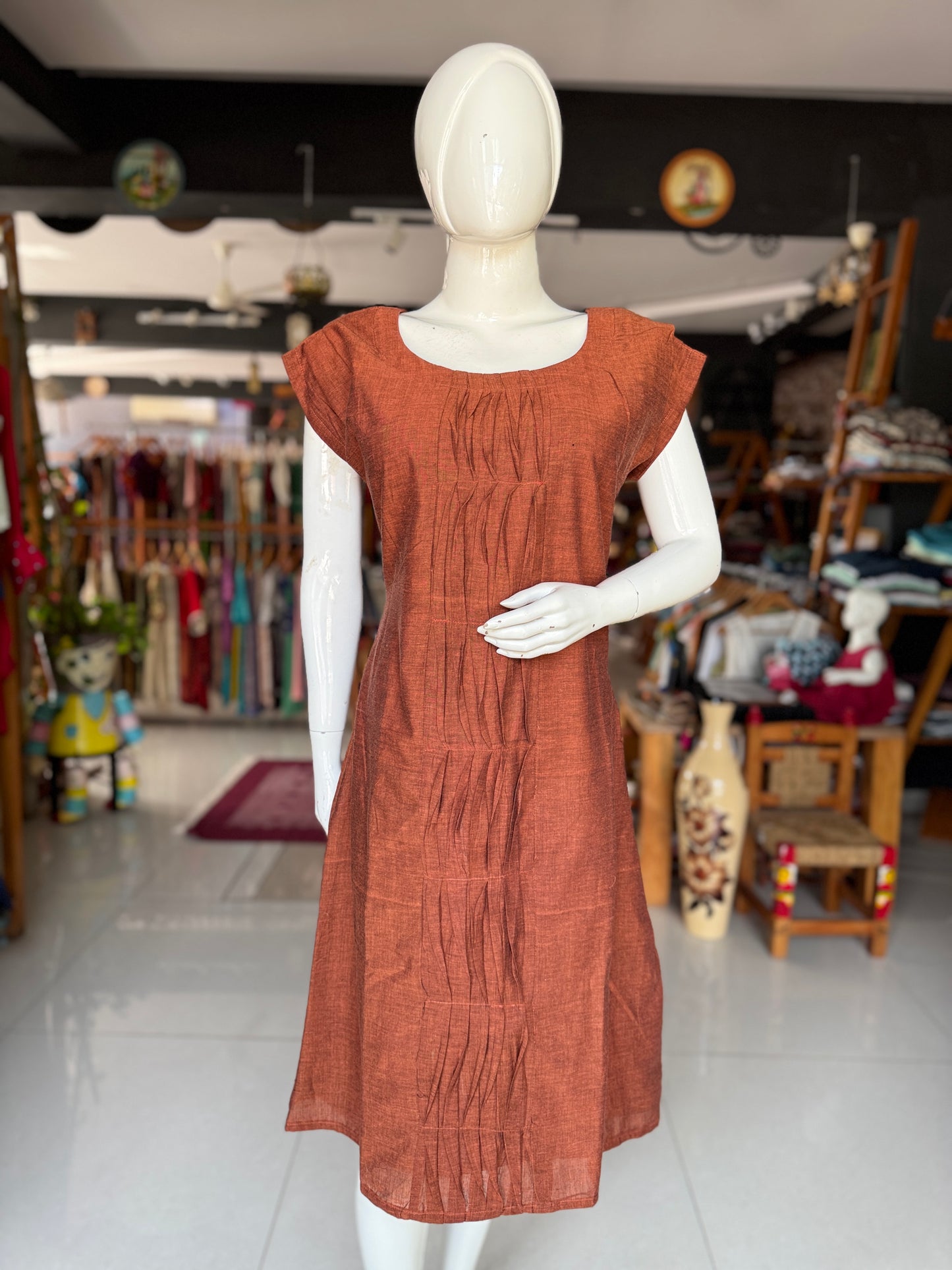 Brown handwoven soft mul cotton dress with twisted pintucks center panel and pleated shoulder sleeves