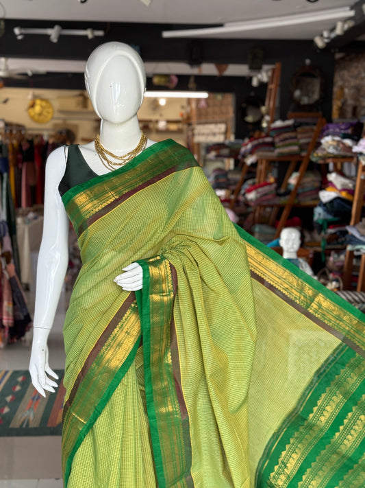 Gadwal cottons - green handwoven Gadwal cotton saree with silk Pallu and borders