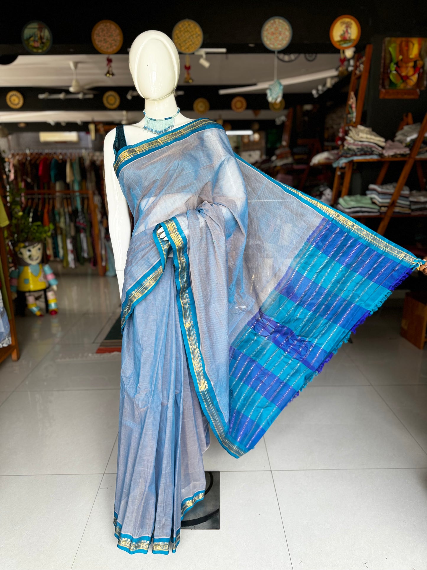 Blue handwoven Gadwal cotton saree with copper sulphate blue pure silk pallu and borders