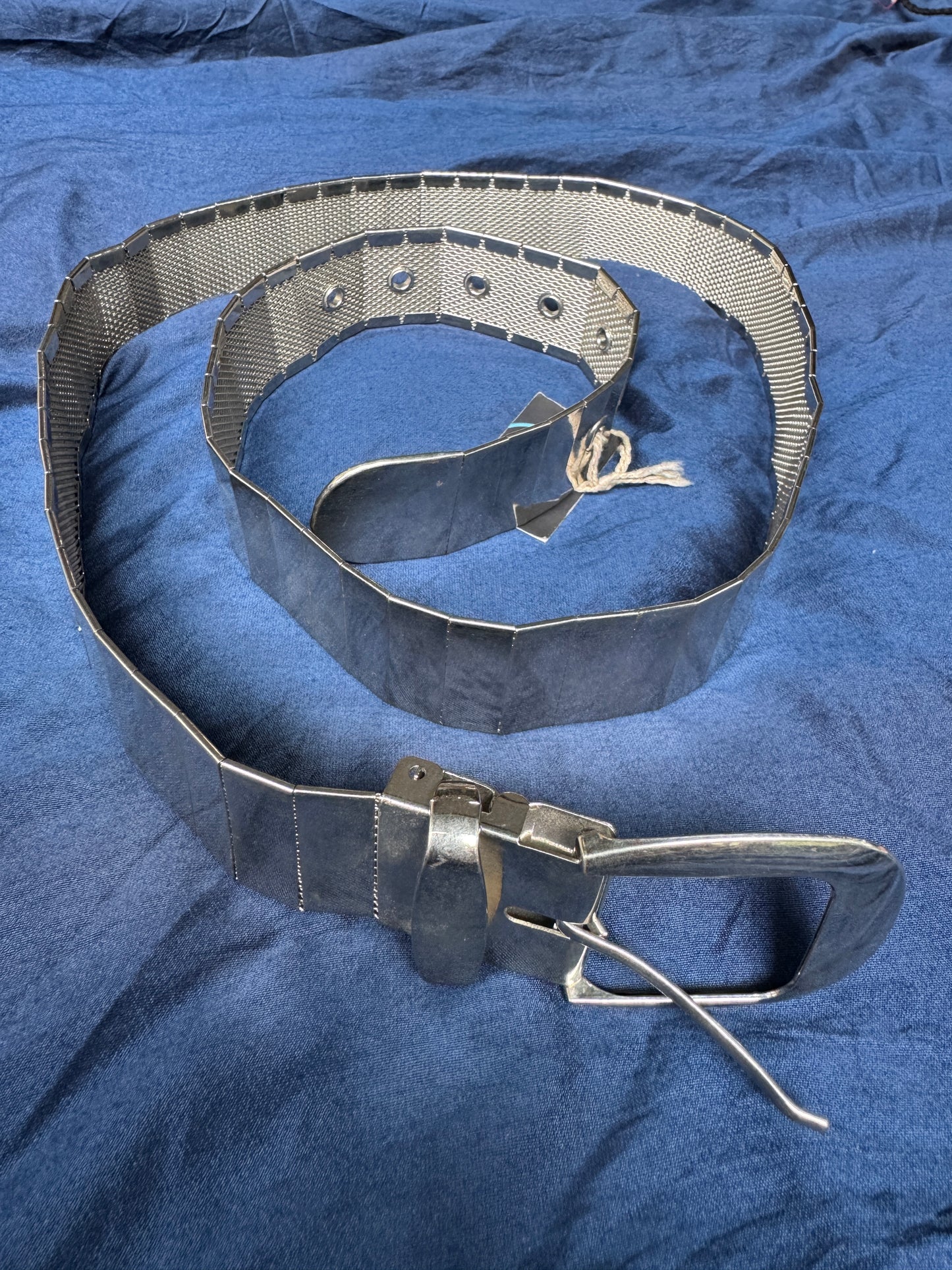Steel look belt with buckle