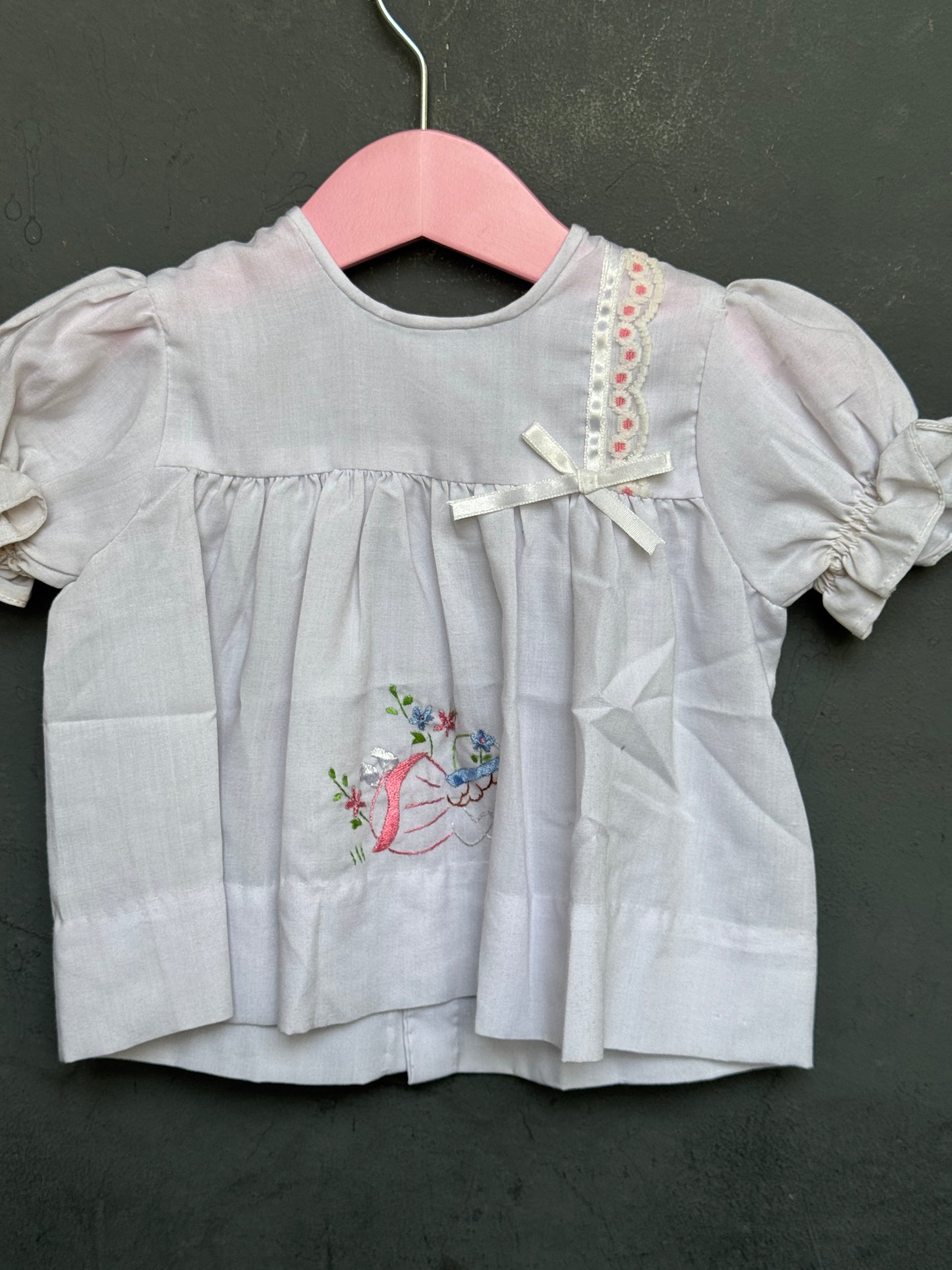 White embroidered cotton frock with cute girl embroidery