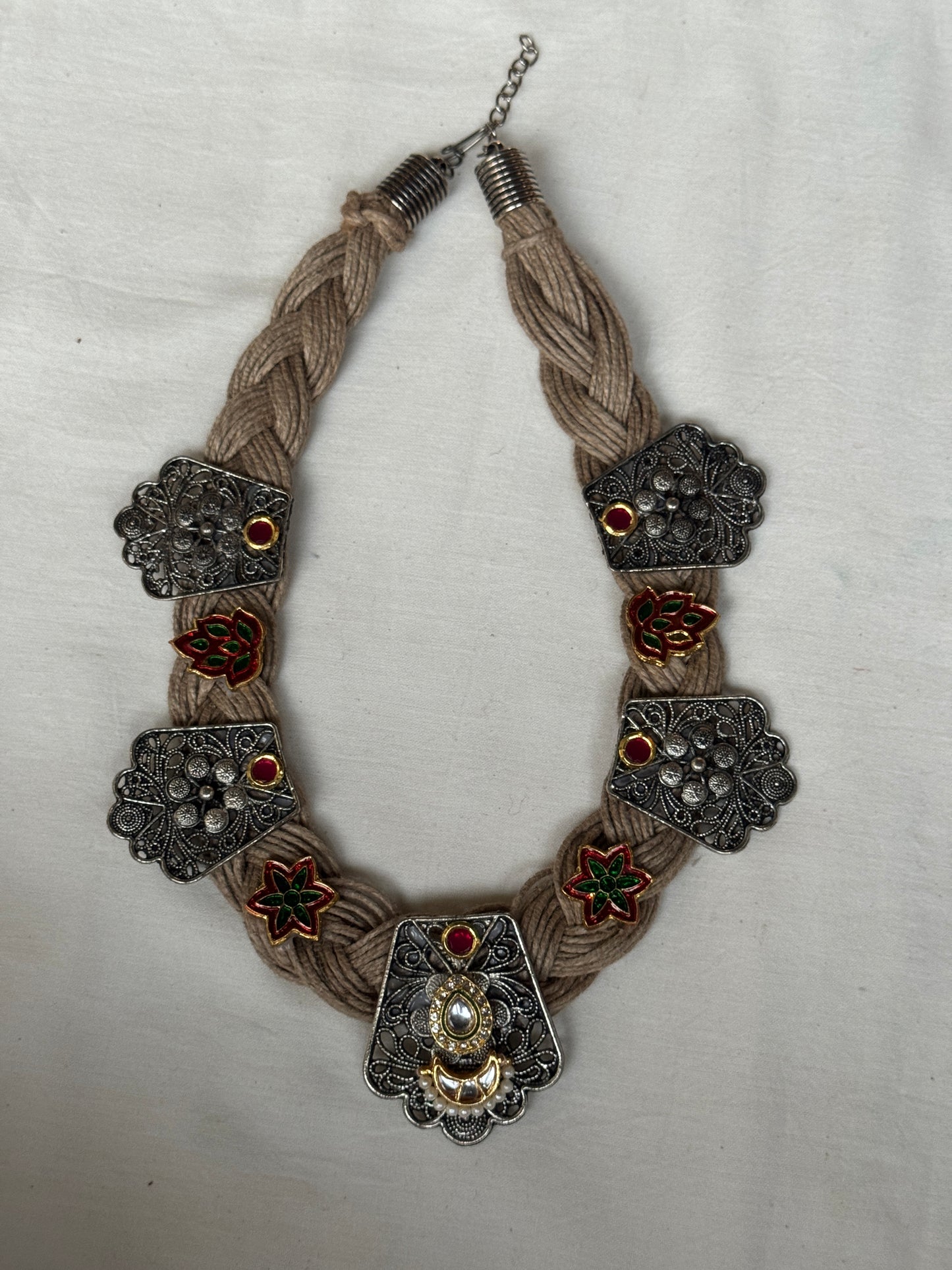 Jute braided chain with dual plated brass motifs necklace