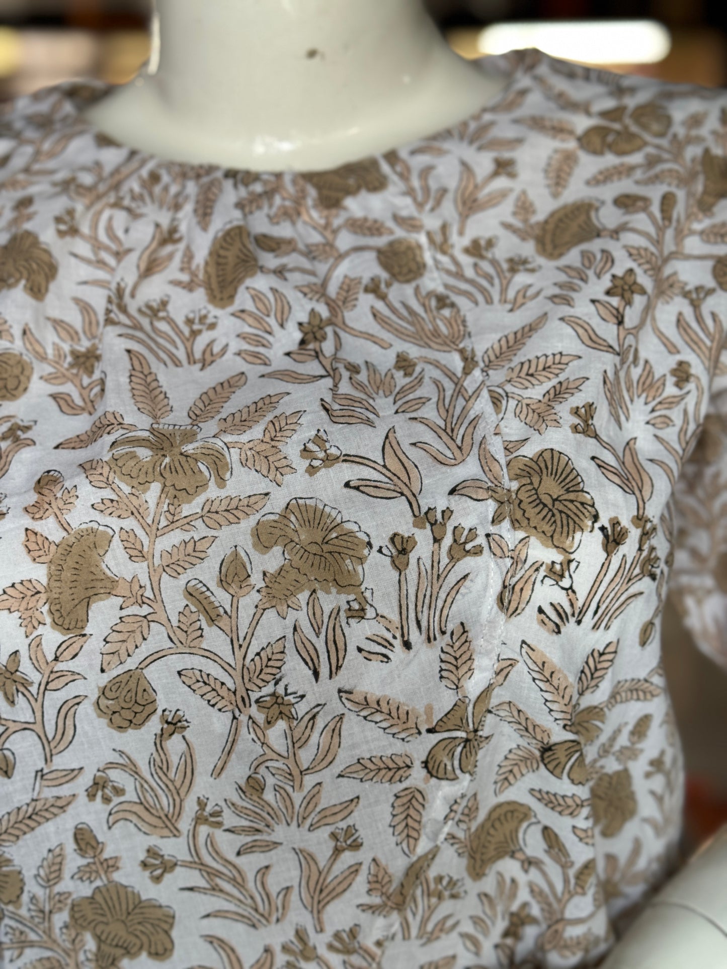 White and brown hand block printed cotton top with curved front
