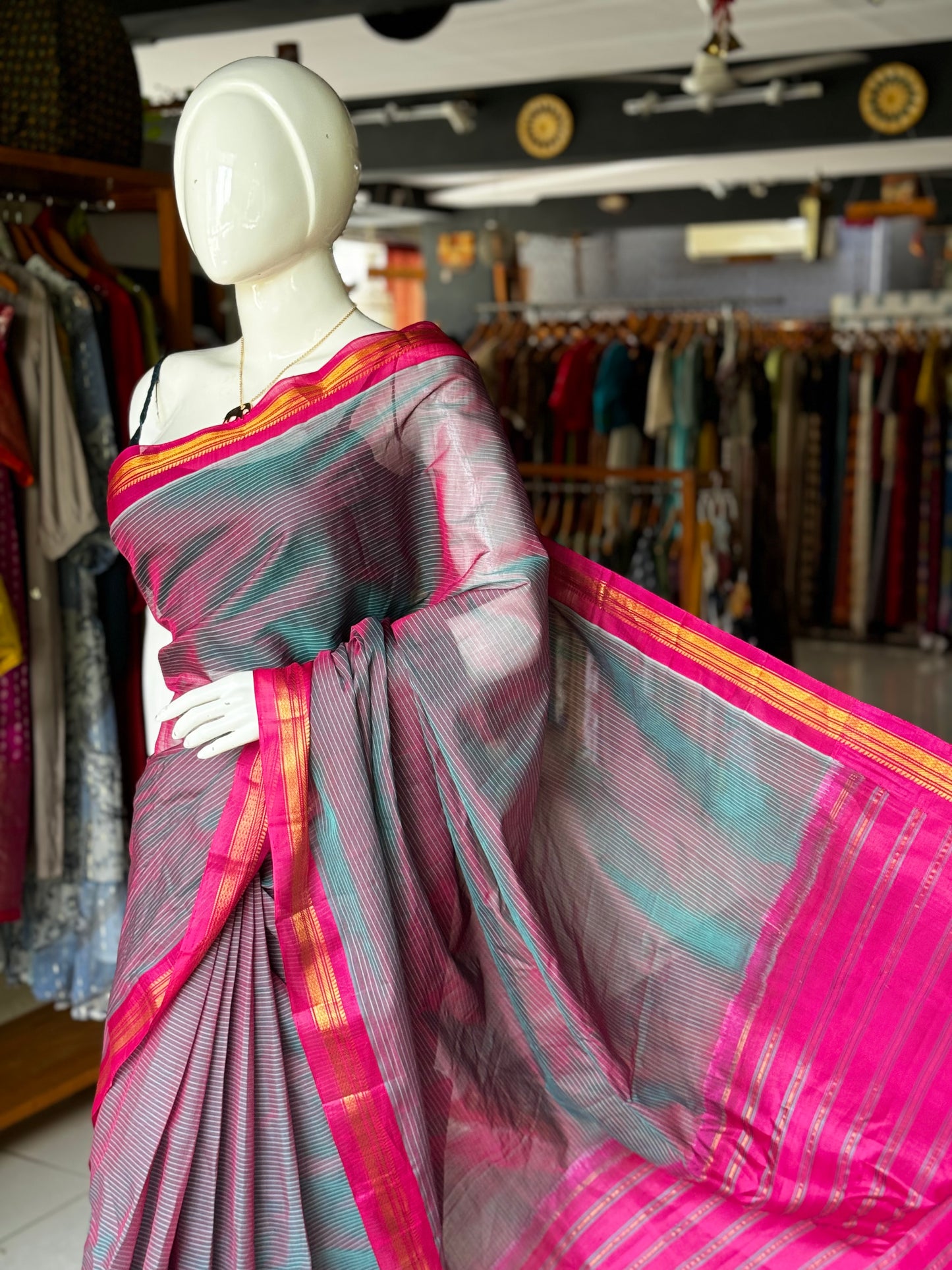 Handwoven Gadwal cotton saree with bright pink pure silk pallu and borders