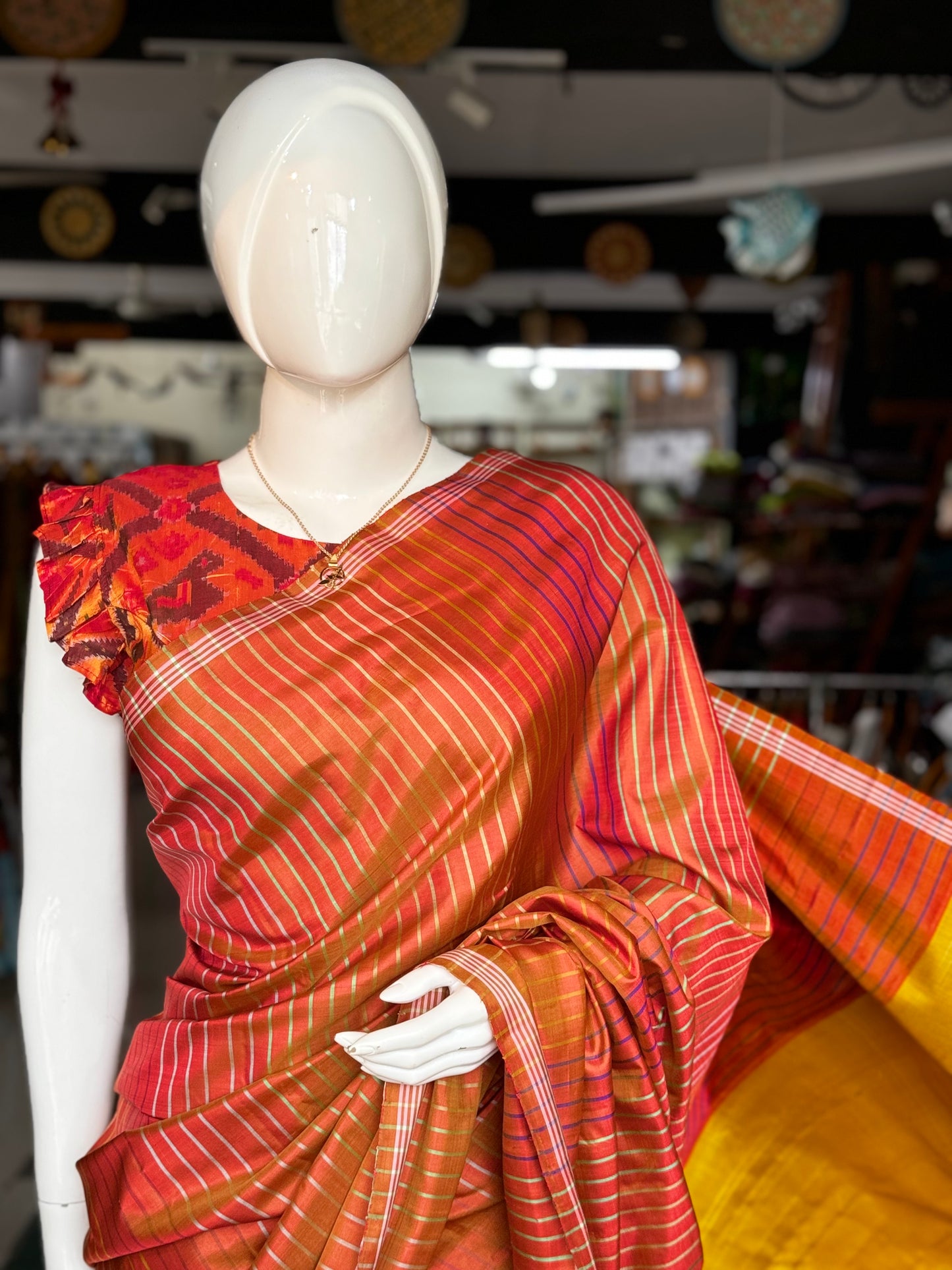 Orange pure silk handloom kanjeevaram pattu saree with multi colored stripes all over