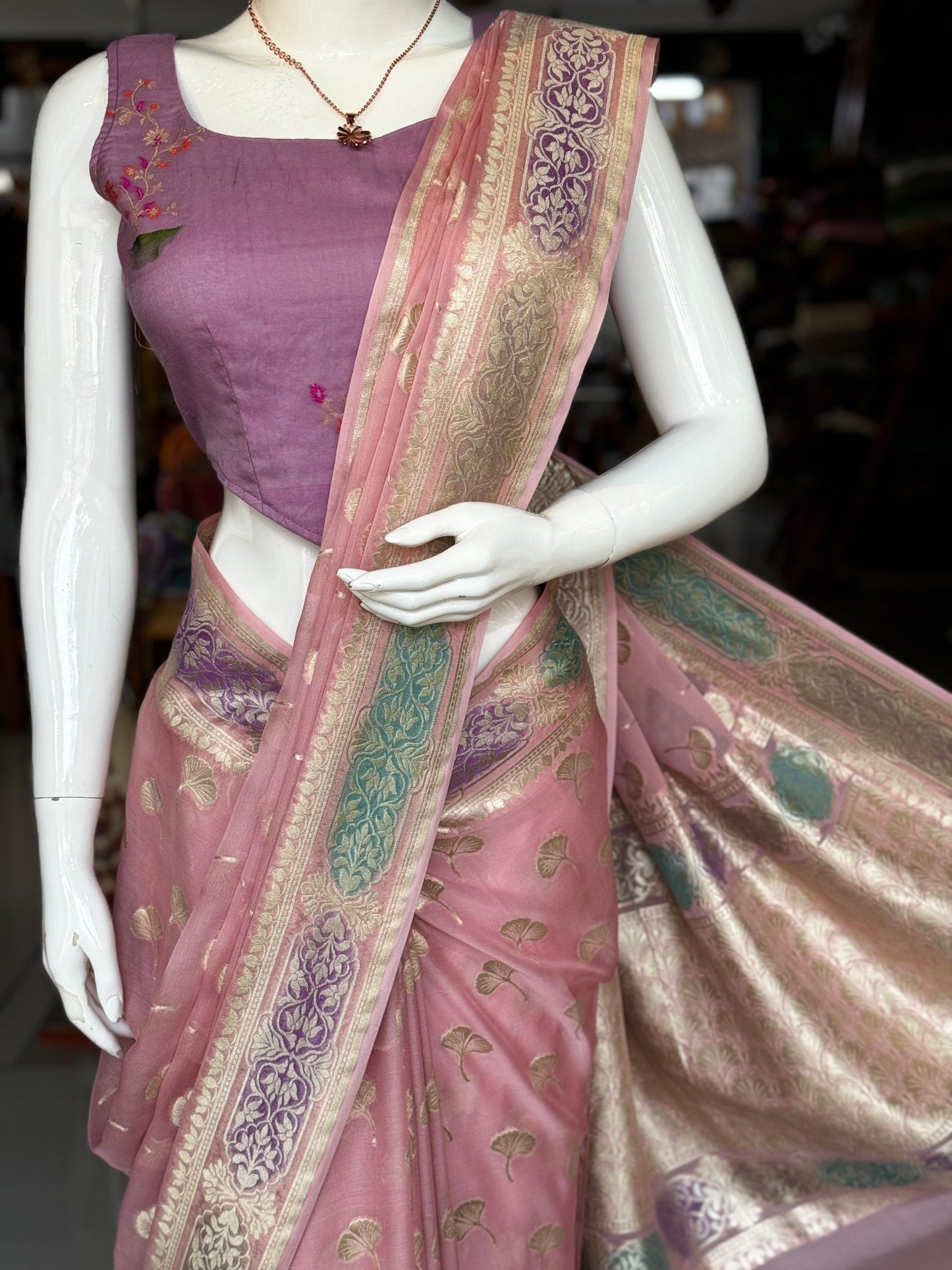 Light pink Banarasi georgette saree with colorful painted border