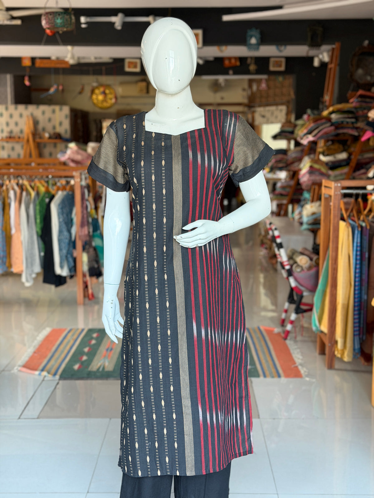 Black hand woven cotton straight kurti with beige and red Ikat designs