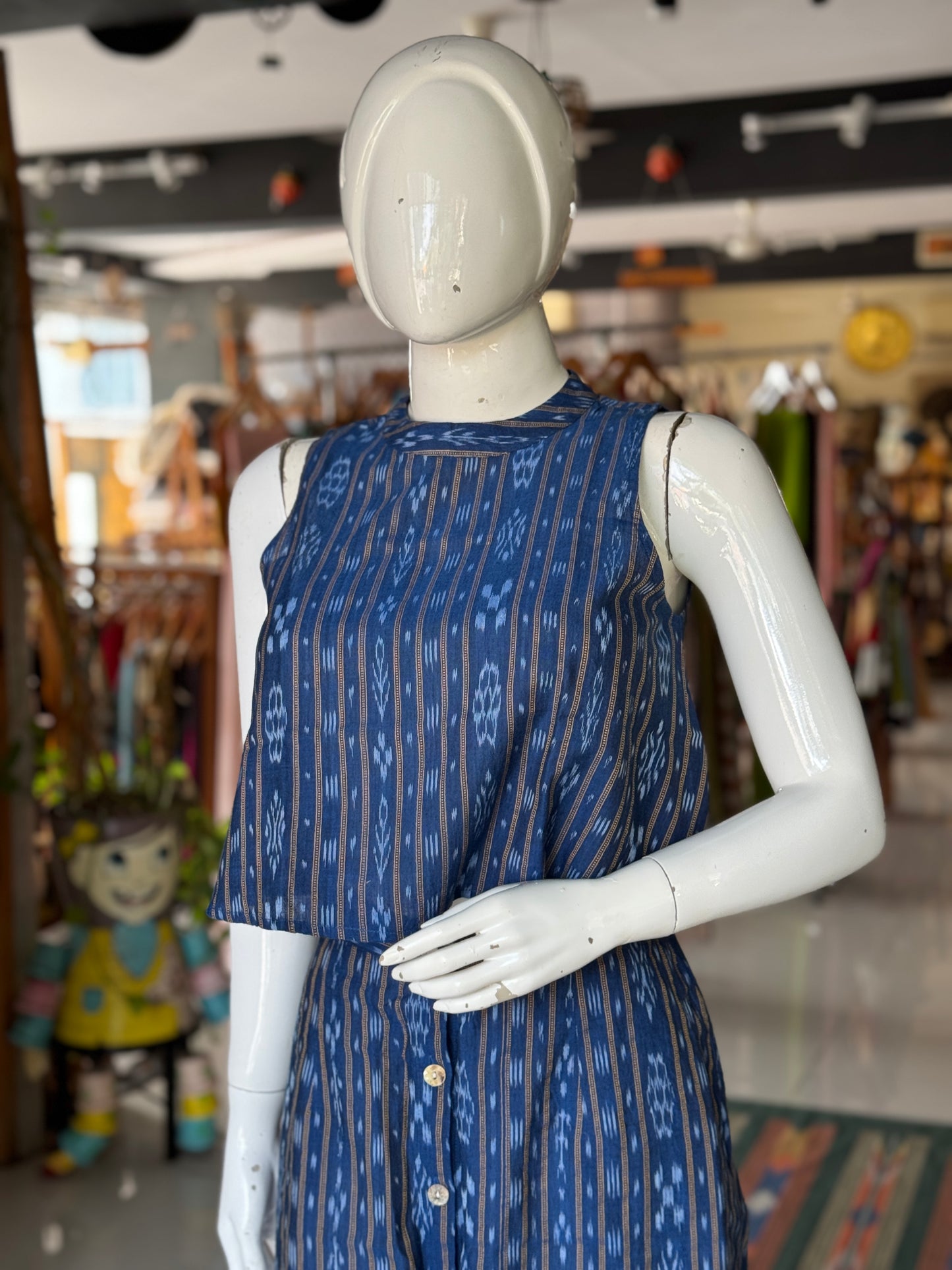 Blue ikat handwoven cotton coord set with sleeveless crop top and skirt with front buttons detailing
