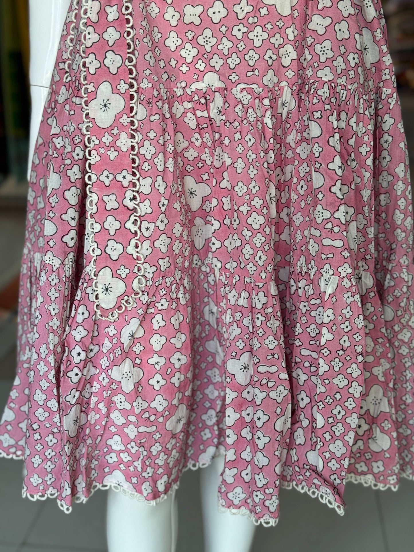 Pink cotton hand block printed tiered dress with belt and lace detailing