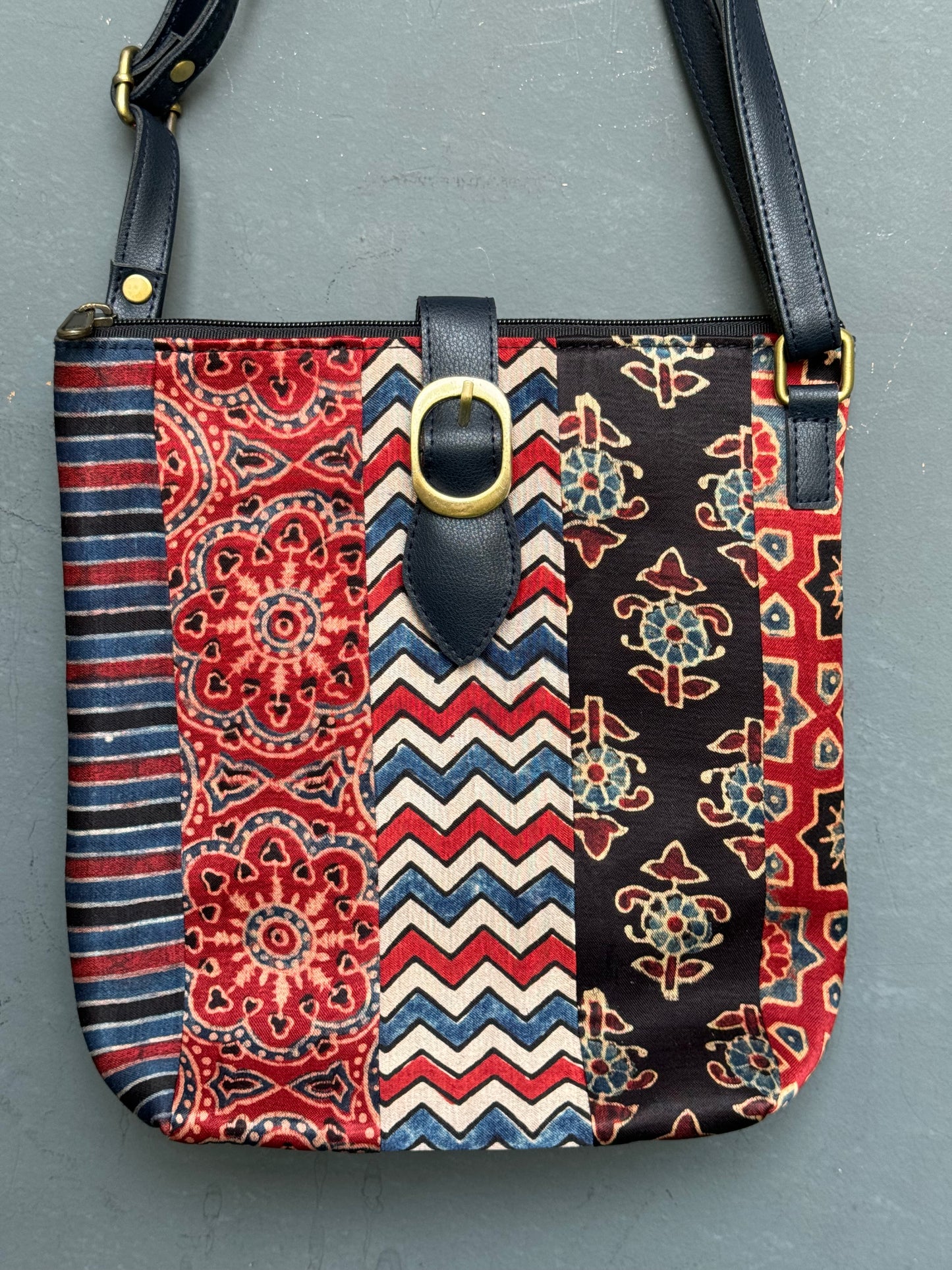 Multi colour patch work Mashru Ajrakh and Leather hand crafted sling bag