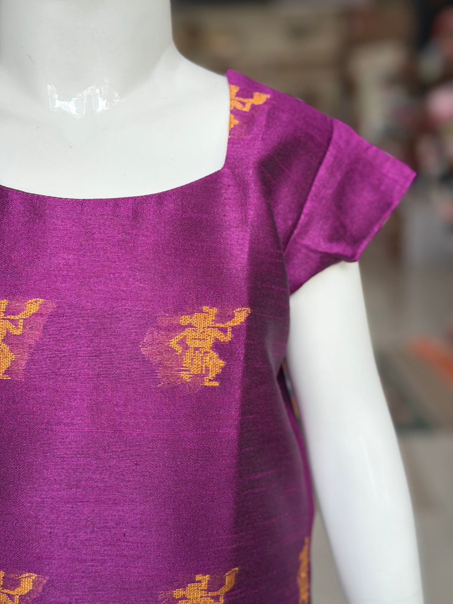 Purple hand woven raw silk kurti with tribal motifs for girls