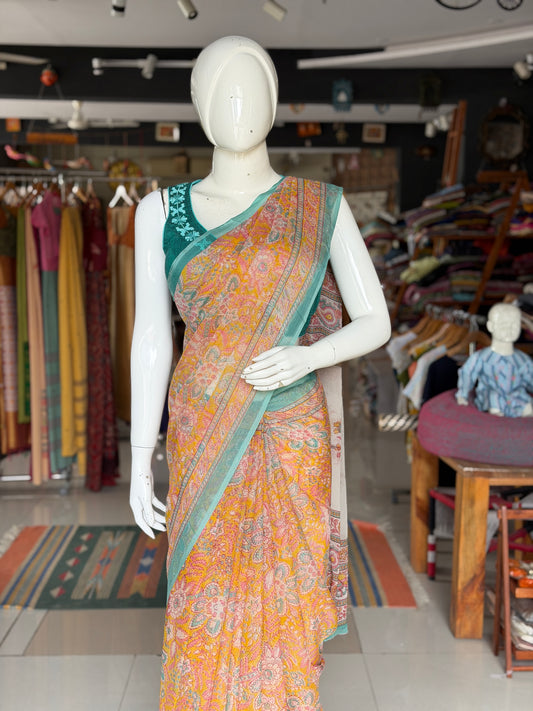 Mustard yellow Chiffon floral printed saree with teal border