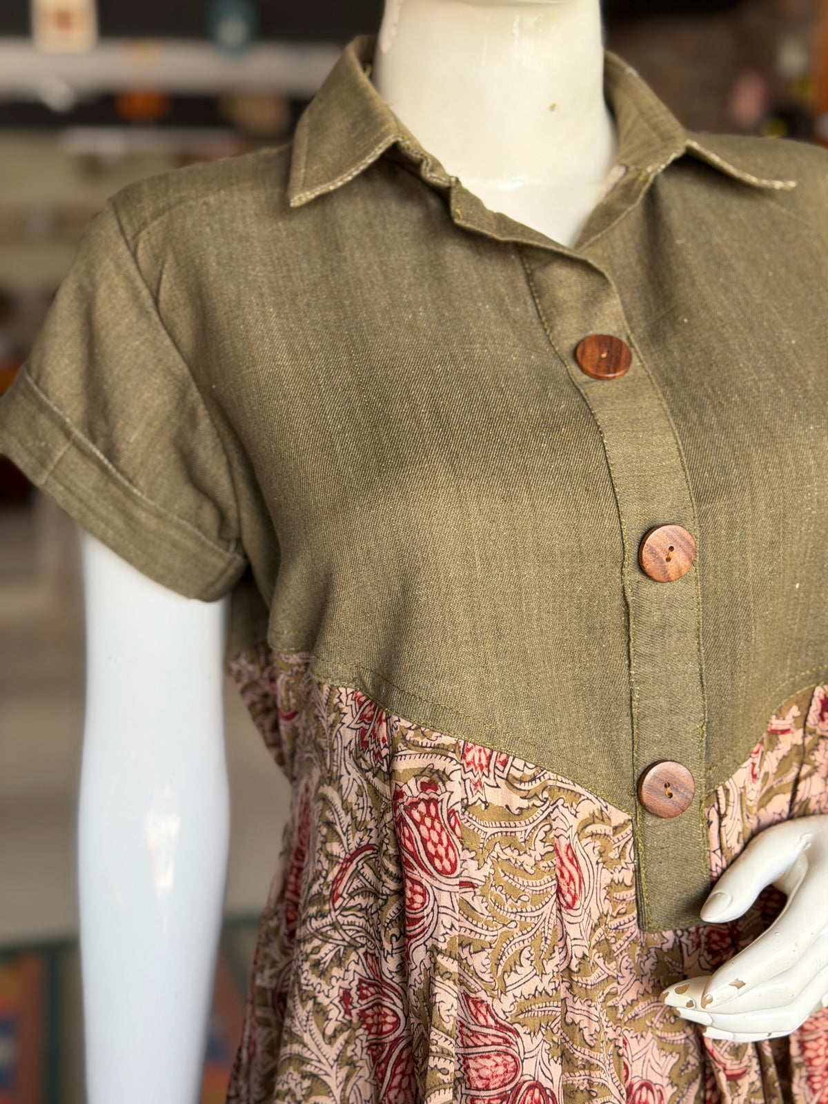 Green denim weave cotton hand woven playful shirt look dress with Kalamkari hand block printed attached skirt with pockets