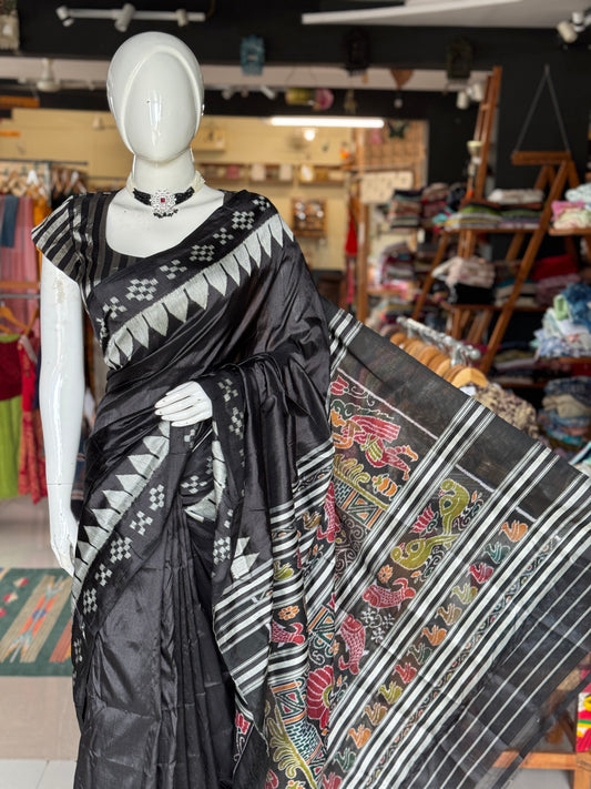 Ikat splendor - black and silver pure silk handloom saree with colorful Ikat pallu and temple border