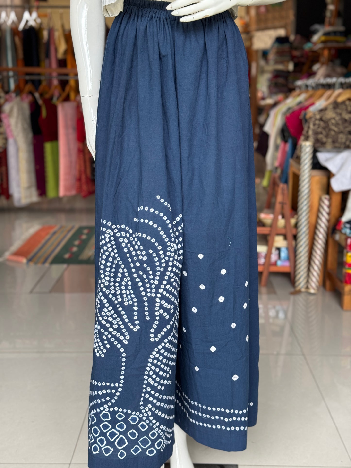 Placement bandini cotton blue flared pants with hand tie n dye tree design - free size