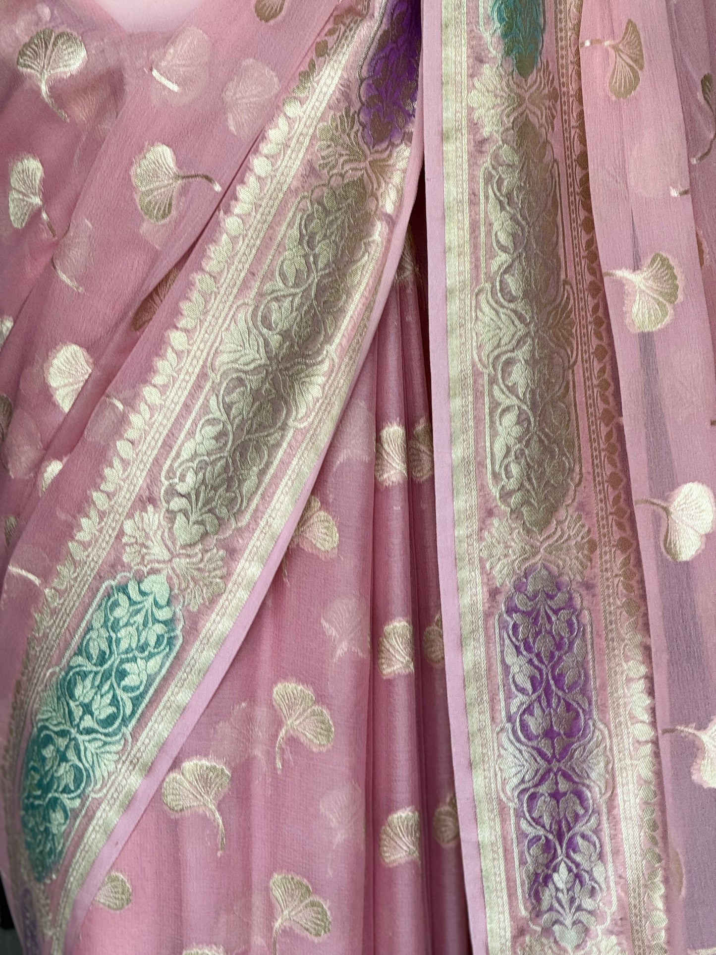 Light pink Banarasi georgette saree with colorful painted border