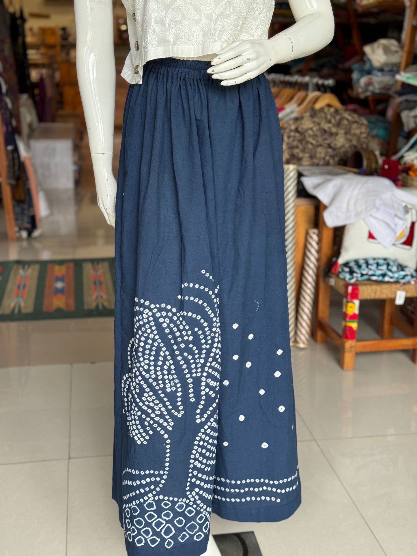 Placement bandini cotton blue flared pants with hand tie n dye tree design - free size