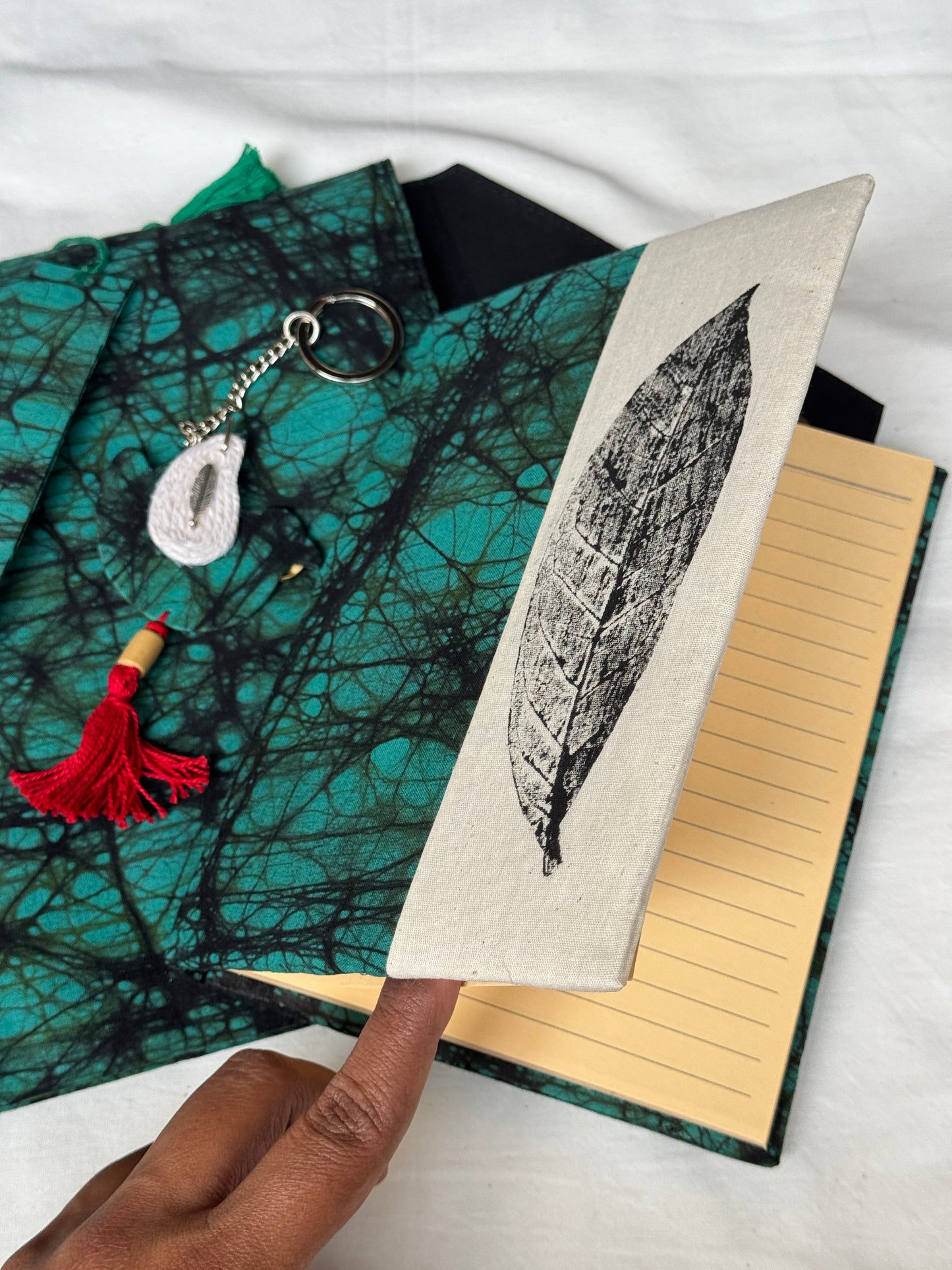 Handmade paper notebook with eco leaf printed fabric cover, hand crafted bookmark, key ring / charm and a container pouch set