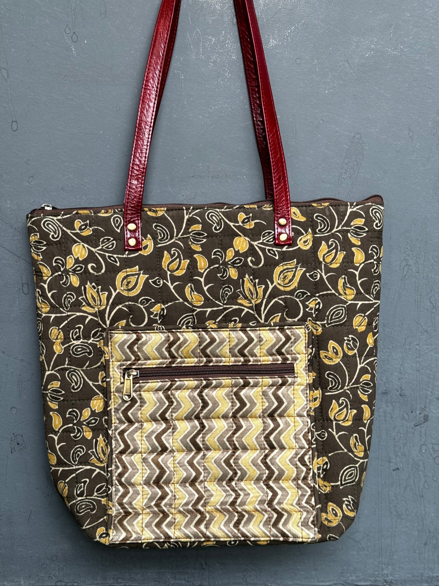 Quilted hand block printed, hand crafted fabric tote bag with front pocket and leather handles