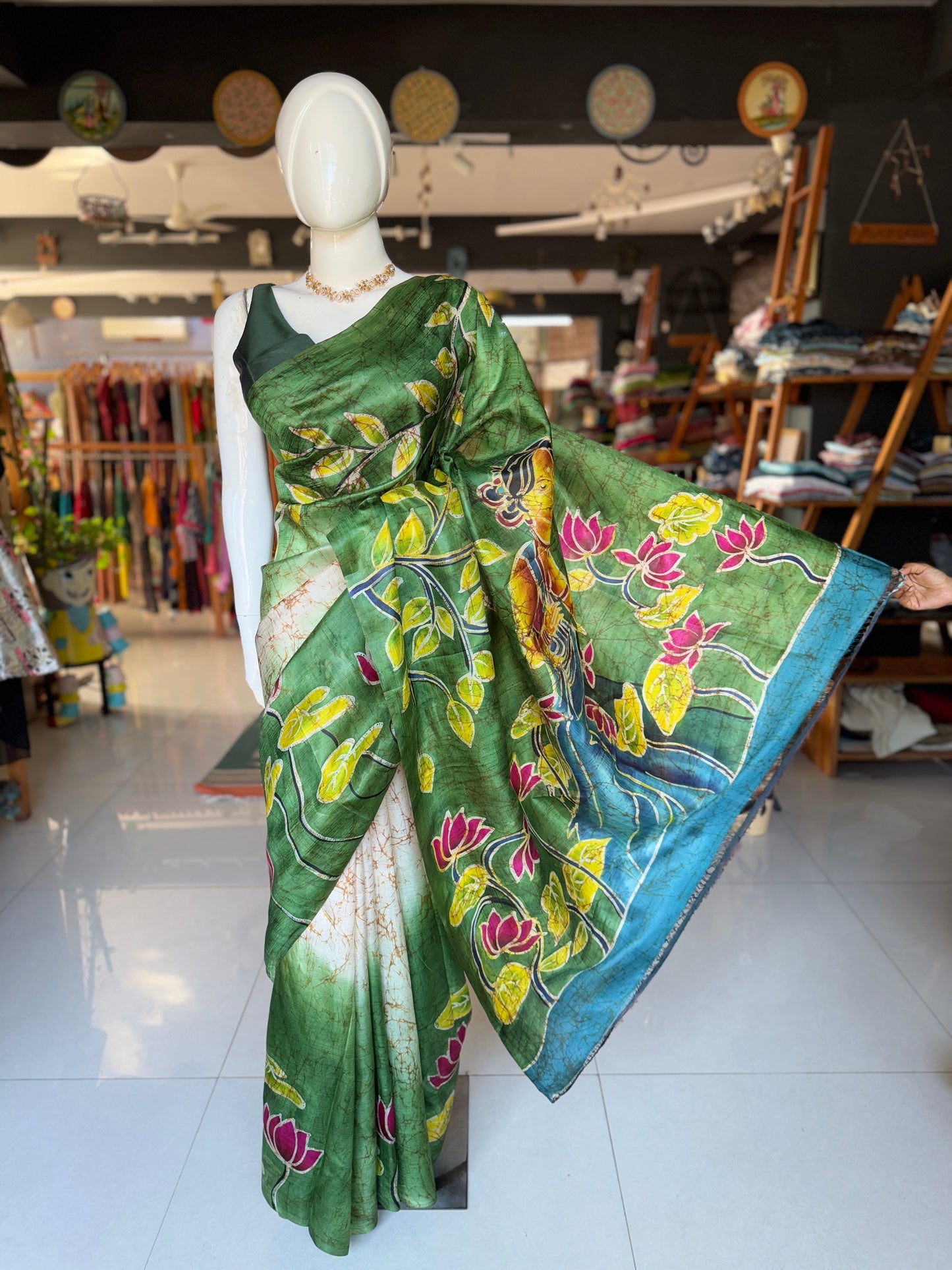 Off white and green hand painted Batik pure katan silk saree - lady with flowers on pallu