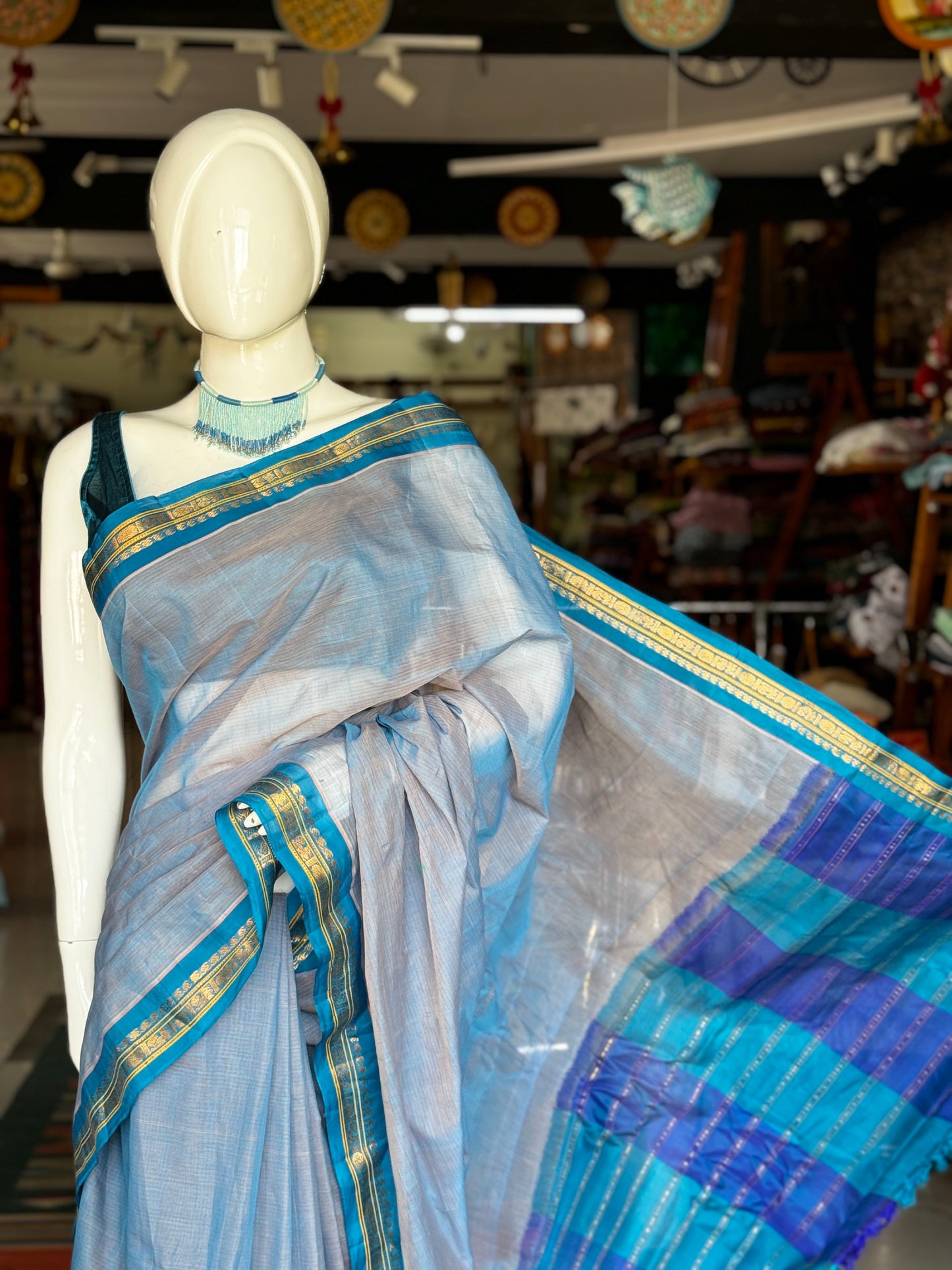 Blue handwoven Gadwal cotton saree with copper sulphate blue pure silk pallu and borders