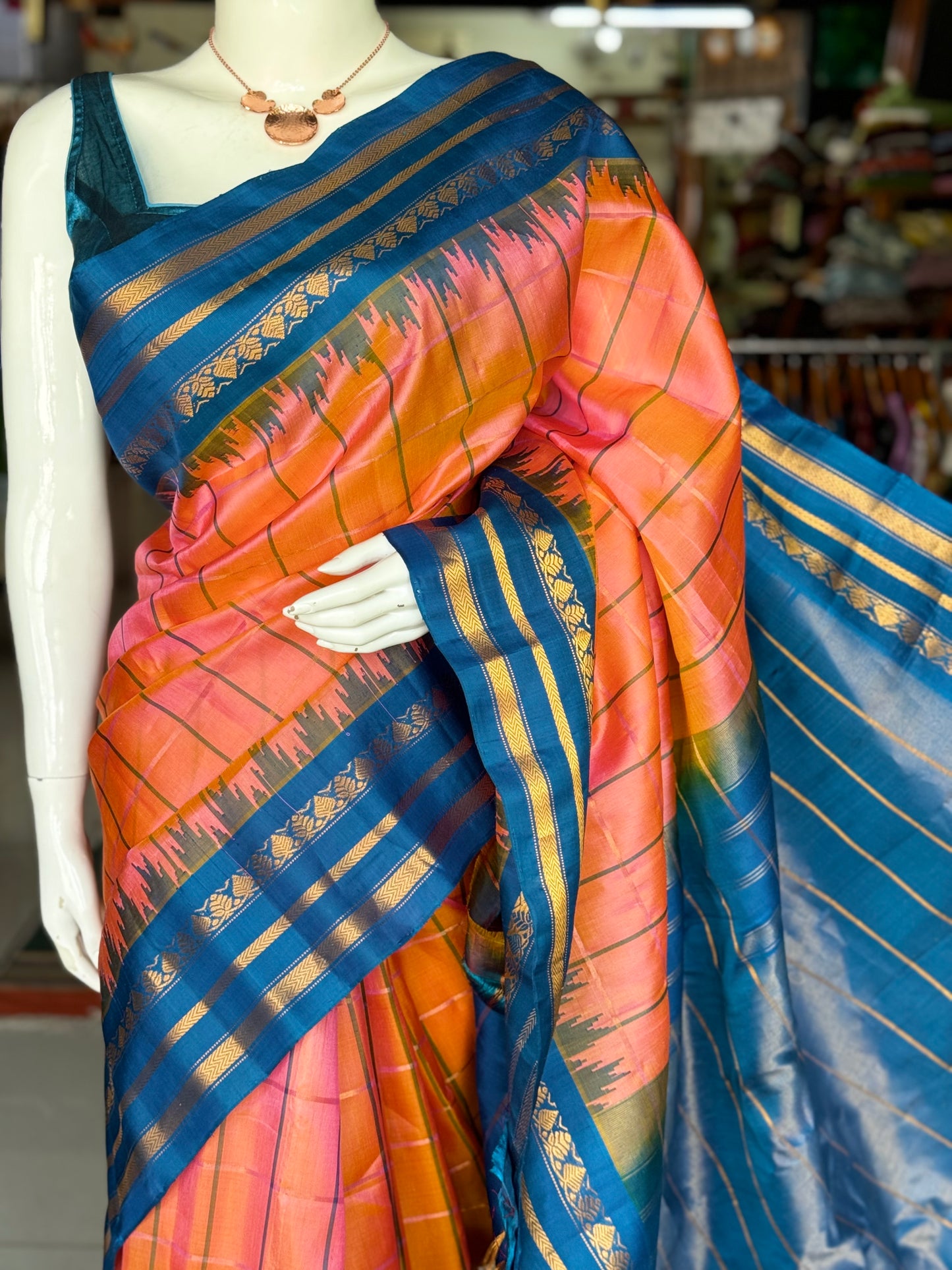 Peach and blue pure silk handwoven Gadwal checks saree with temple border