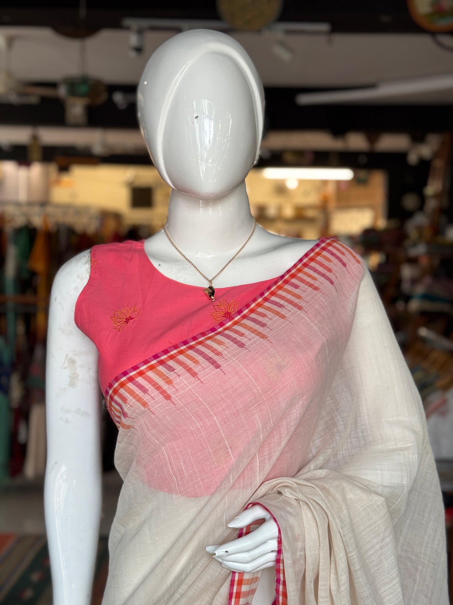 Pink cotton sleeveless blouse with floral machine embroidery - front boat neck, back v-neck