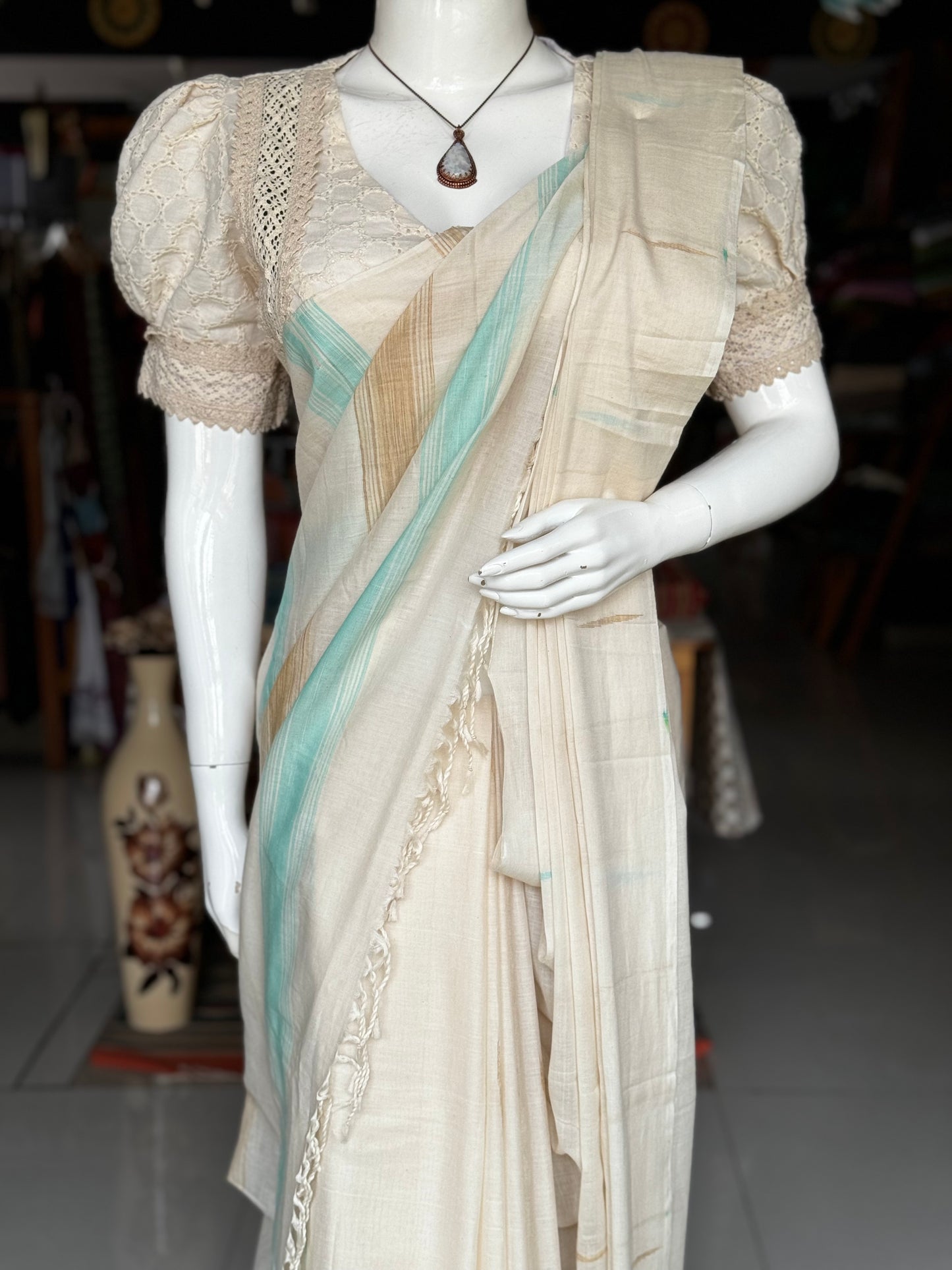 Offwhite pure soft cotton handloom saree with sea green and beige accents