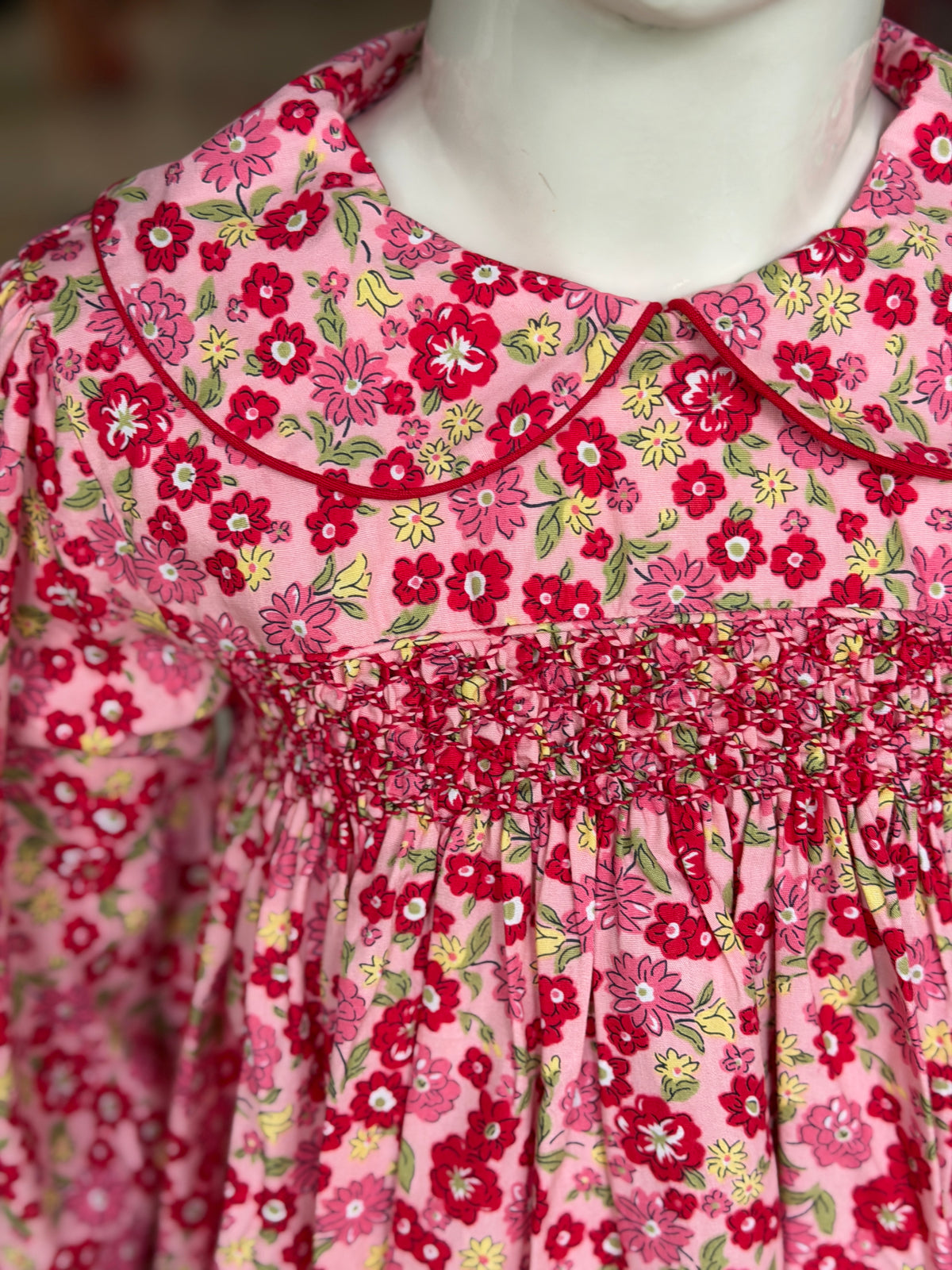 Pink floral smocking cotton frock for girls with collar