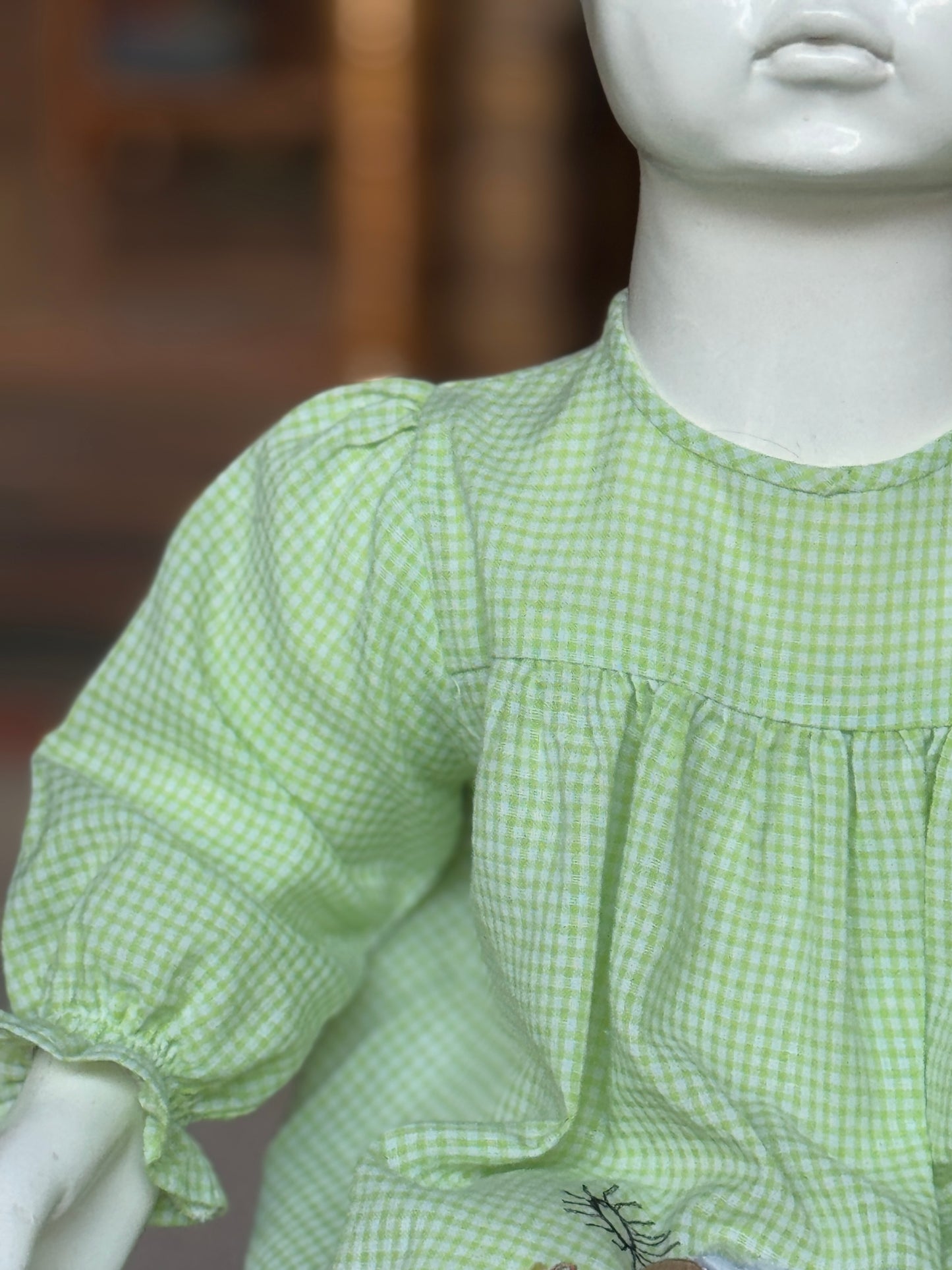 Green checks cotton baby frock with cute embroidery