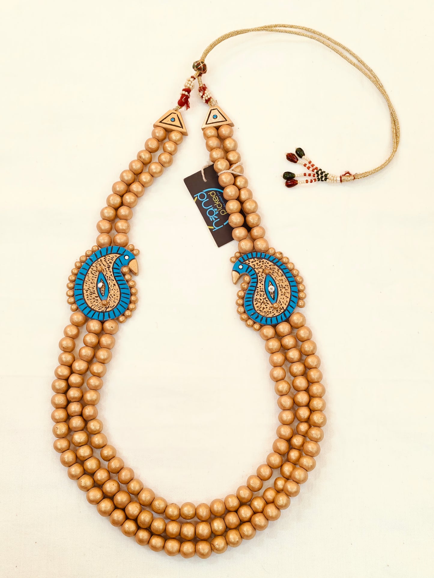 Golden terracotta beads in 3 layers with blue paisley motif neckpiece, jhumki earrings set