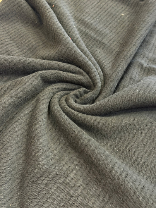 Black cotton hand spun, hand woven fabric with missing thread stripes weave