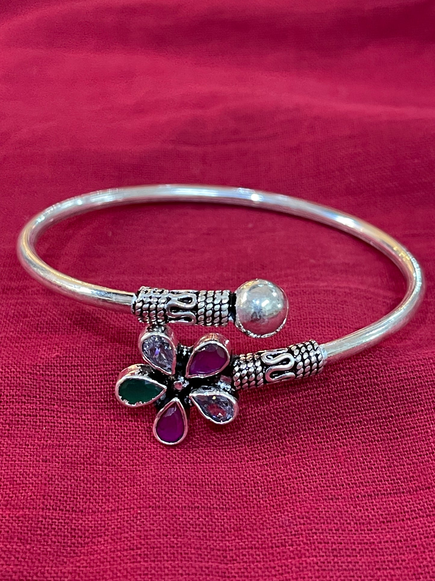 Multi colored stones in flower shape sterling silver adjustable size bracelet