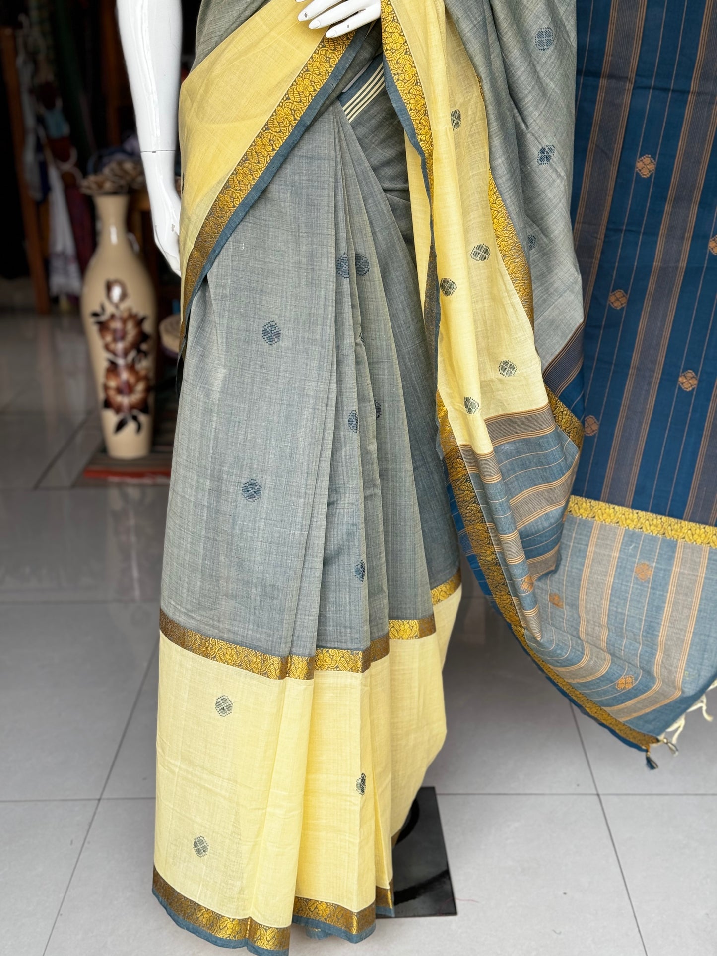 Grey and yellow pure soft cotton handloom saree with butis and double border