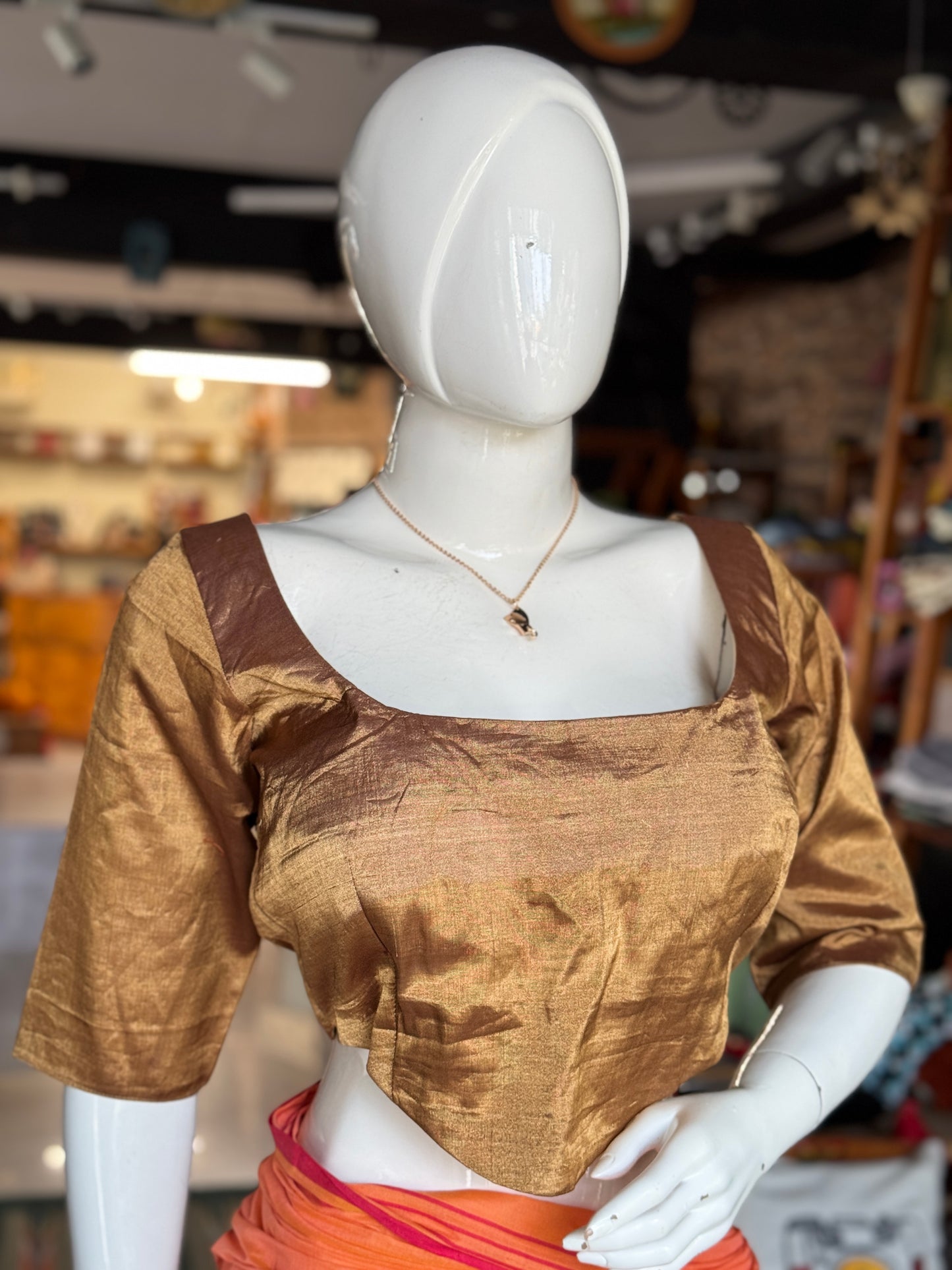 Gold tissue silk Chanderi handloom blouse with wide neck line, waist curve line and sleeves