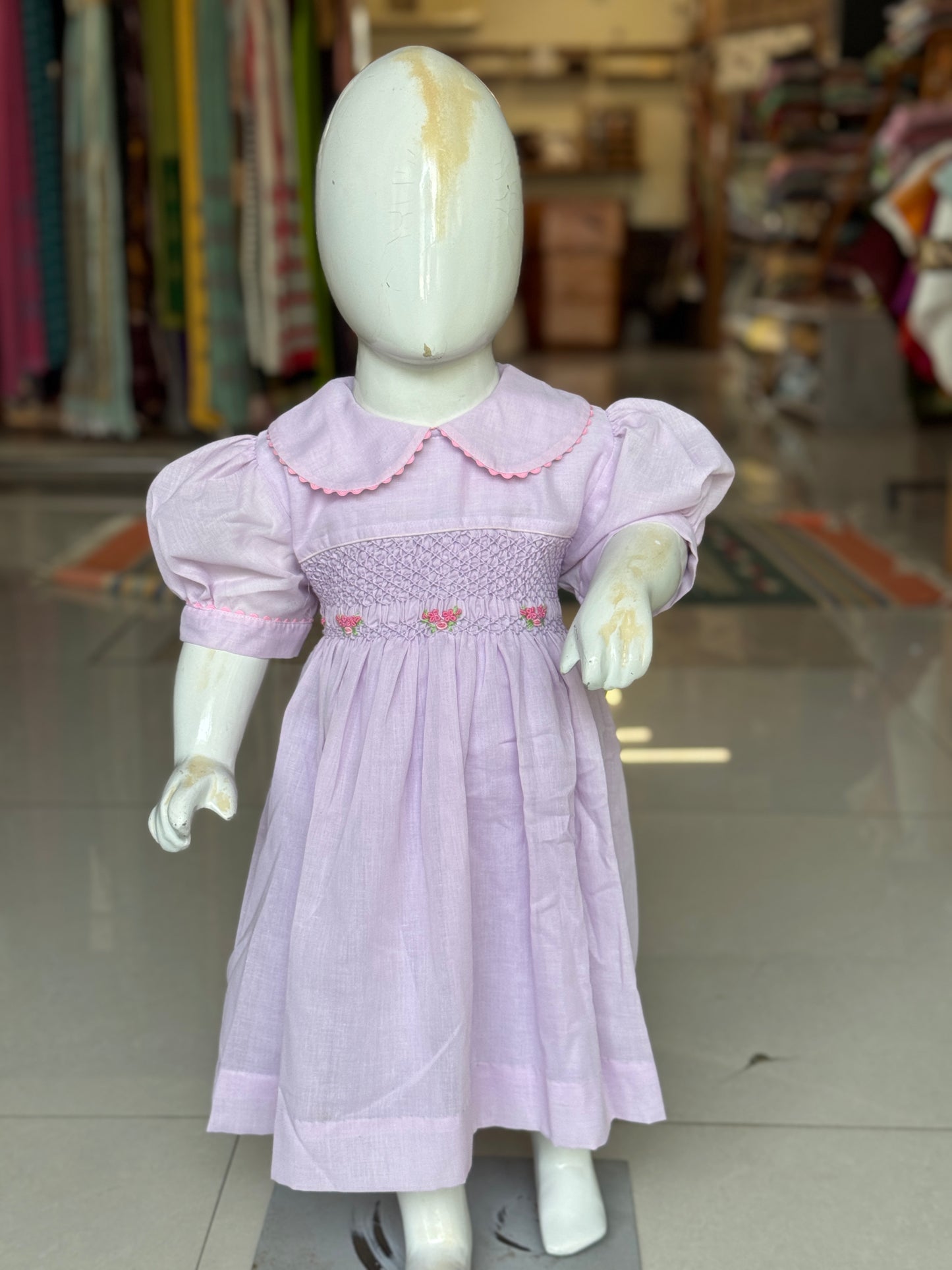 Lavender hand embroidered smocking cotton frock for girls with collar and lace trims