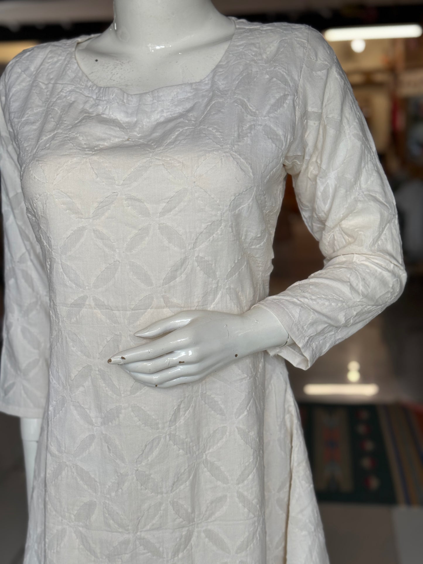Off White appliq hand crafted cotton A-line kurti