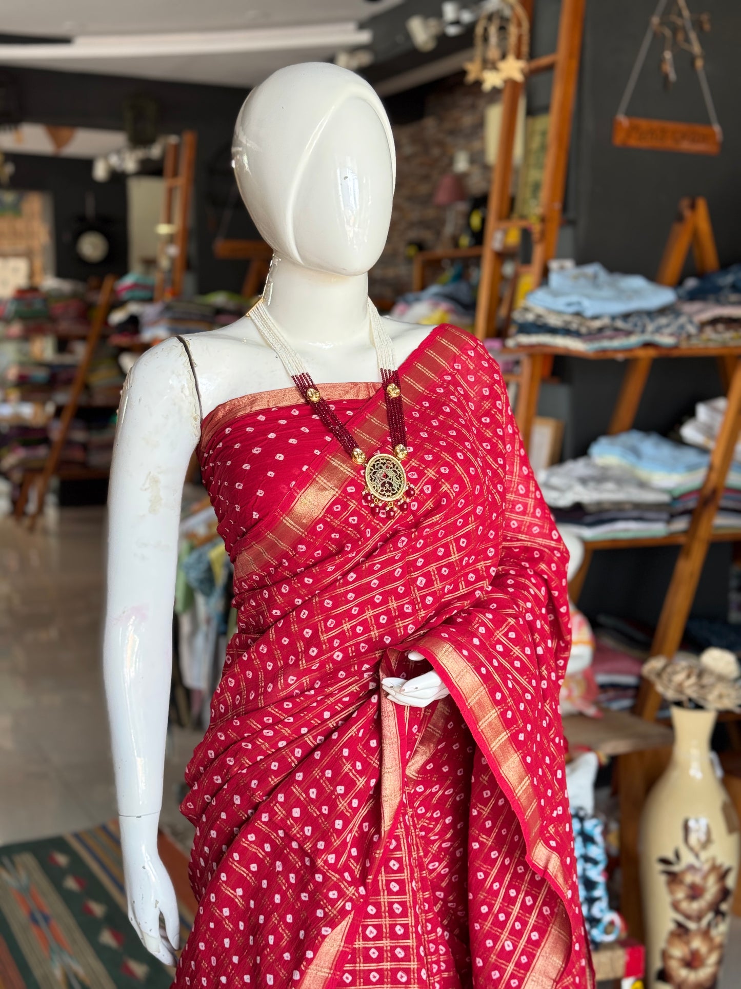 Reddish maroon gharchola bandini tie n dye cotton saree with zari checks