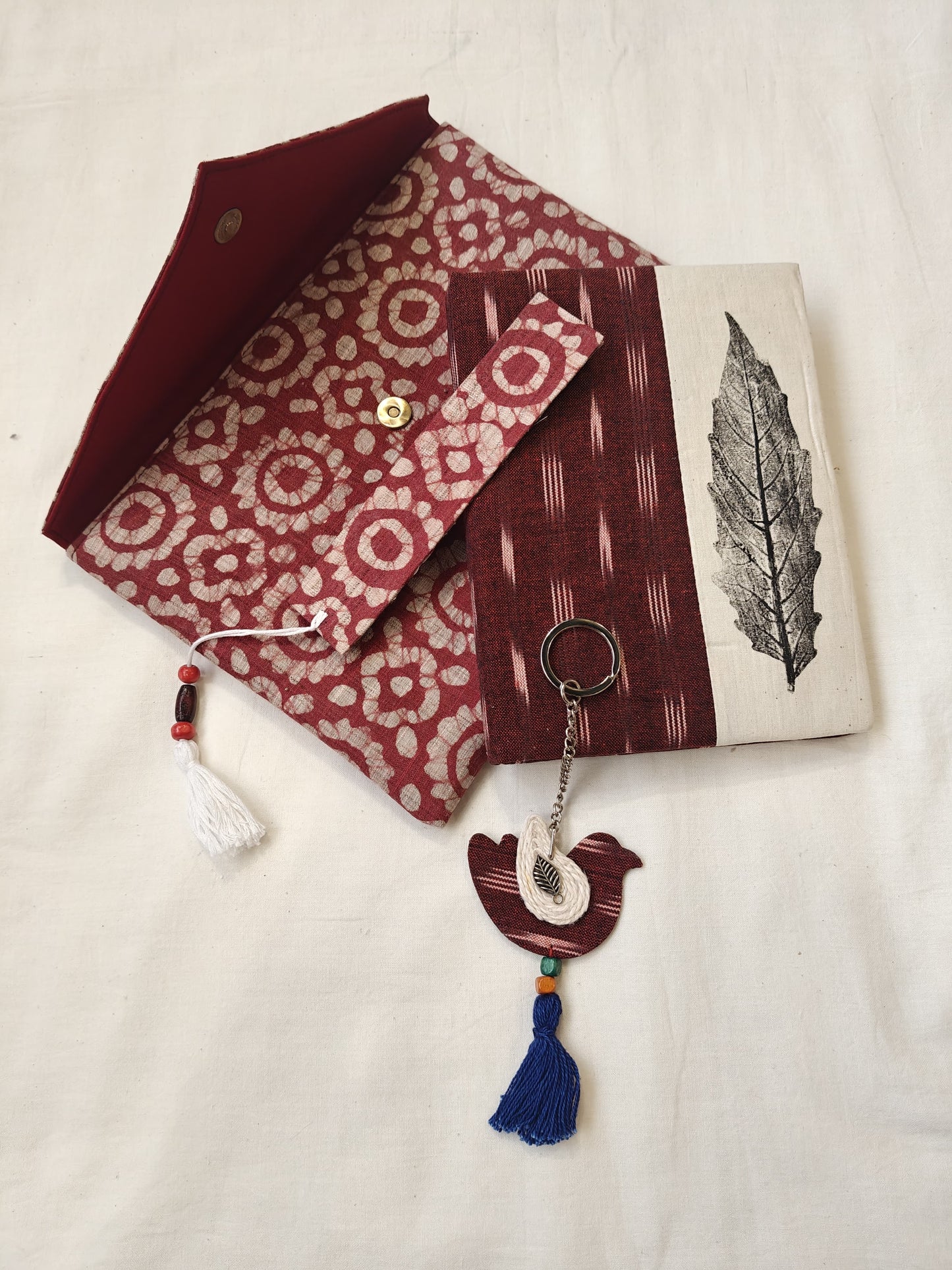Handmade paper notebook with eco leaf printed fabric cover, hand crafted bookmark, key ring / charm and a container pouch set
