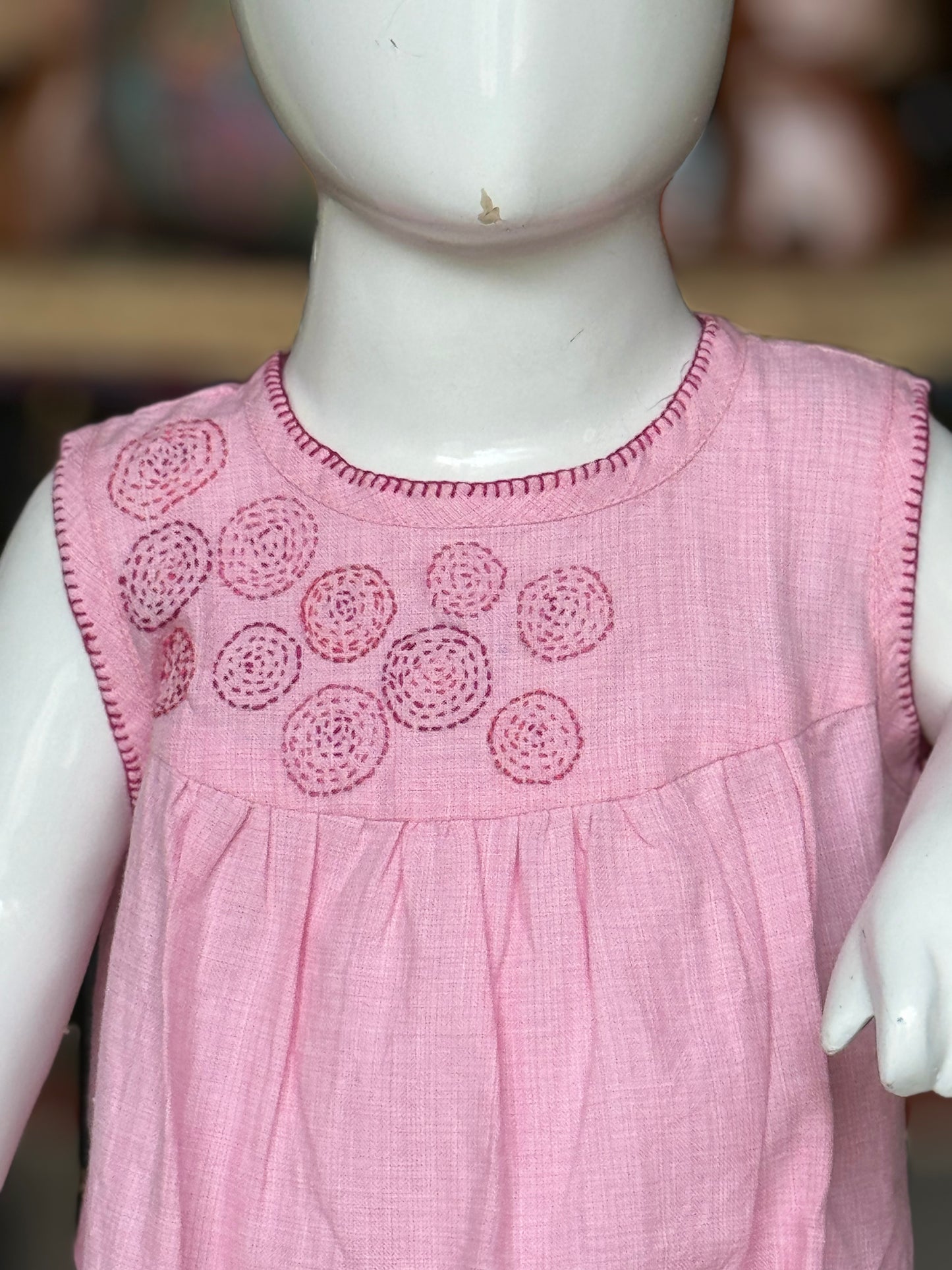 Light pink hand embroidered circles design cotton frock for girls