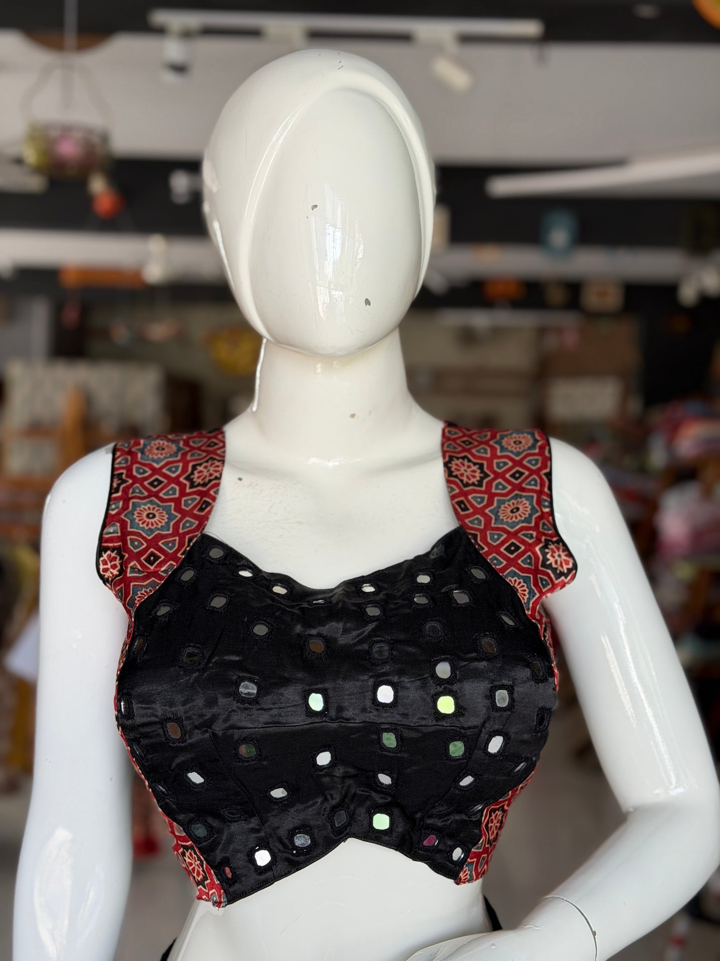 Ajrakh handblock printed Mashru sleeveless blouse with mirror embroidery - click to see colors