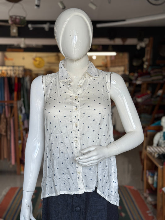 Polka dot prints on white sleeveless top for women