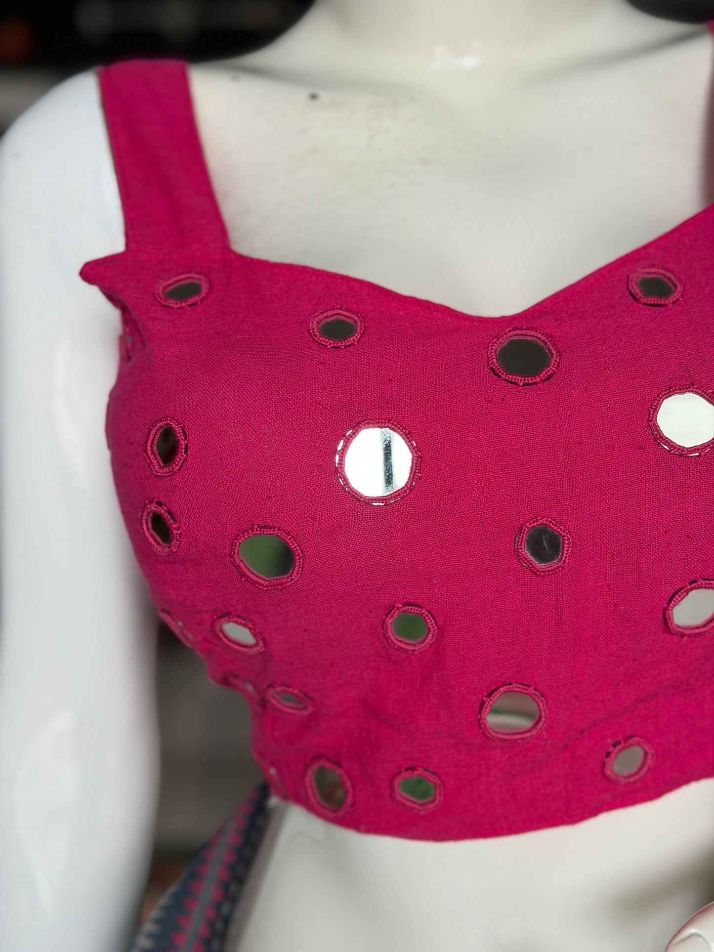 Dark pink kala cotton sleeveless blouse with all over mirror work on front and back with adjustable width back