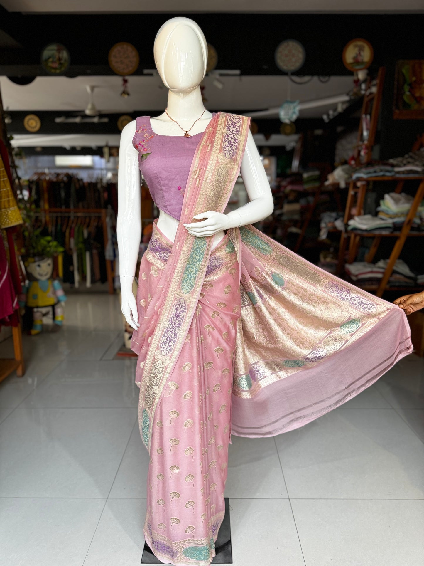 Light pink Banarasi georgette saree with colorful painted border